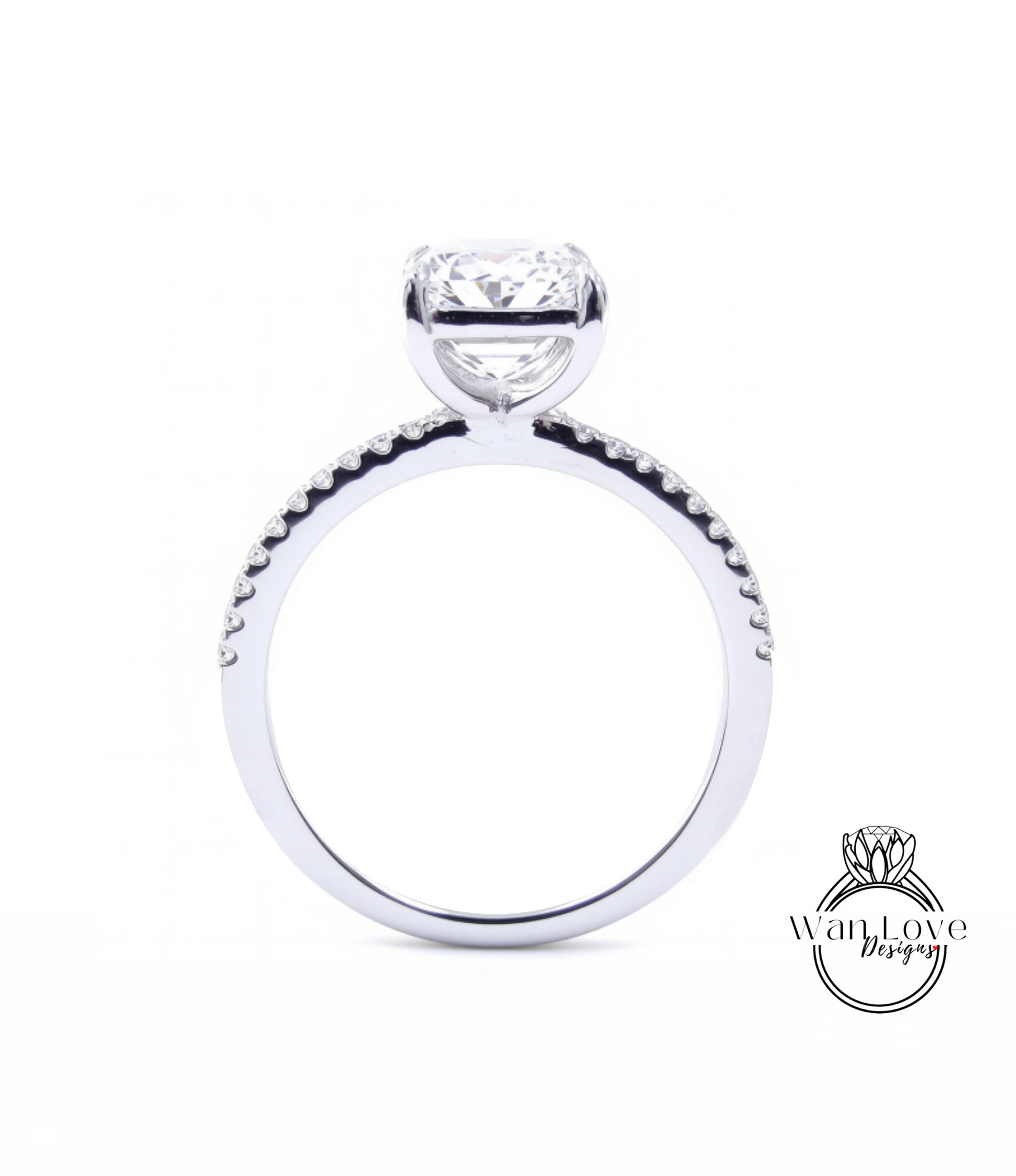 A close-up view of a diamond engagement ring with a large central diamond and smaller diamonds along the band.