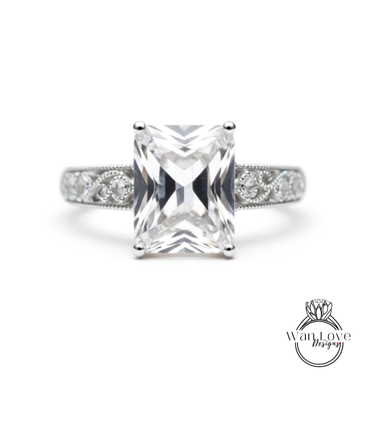 A diamond engagement ring with a large, clear gemstone set in a silver band.