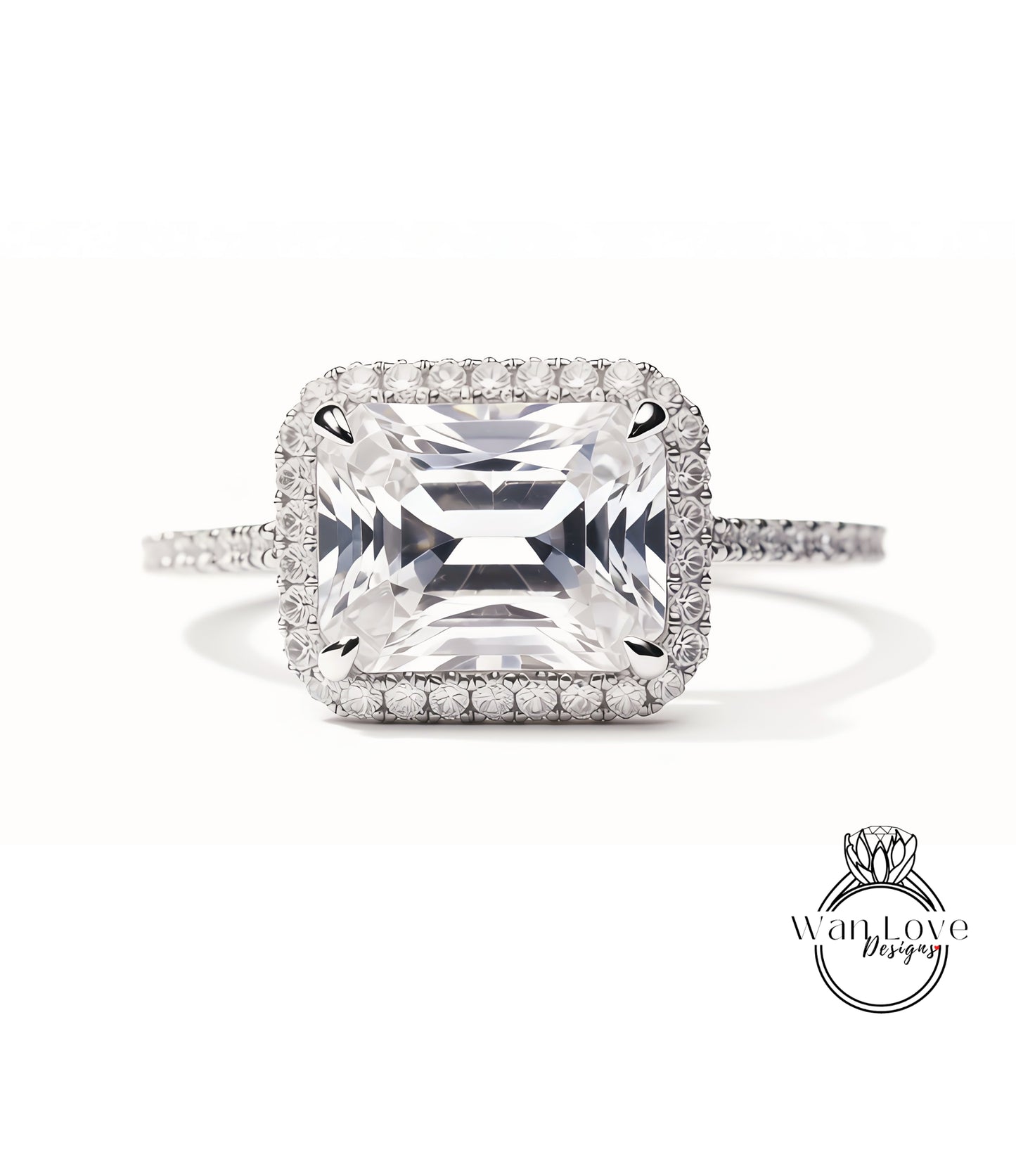 A large, square-cut diamond ring with a halo of smaller diamonds around the center stone.