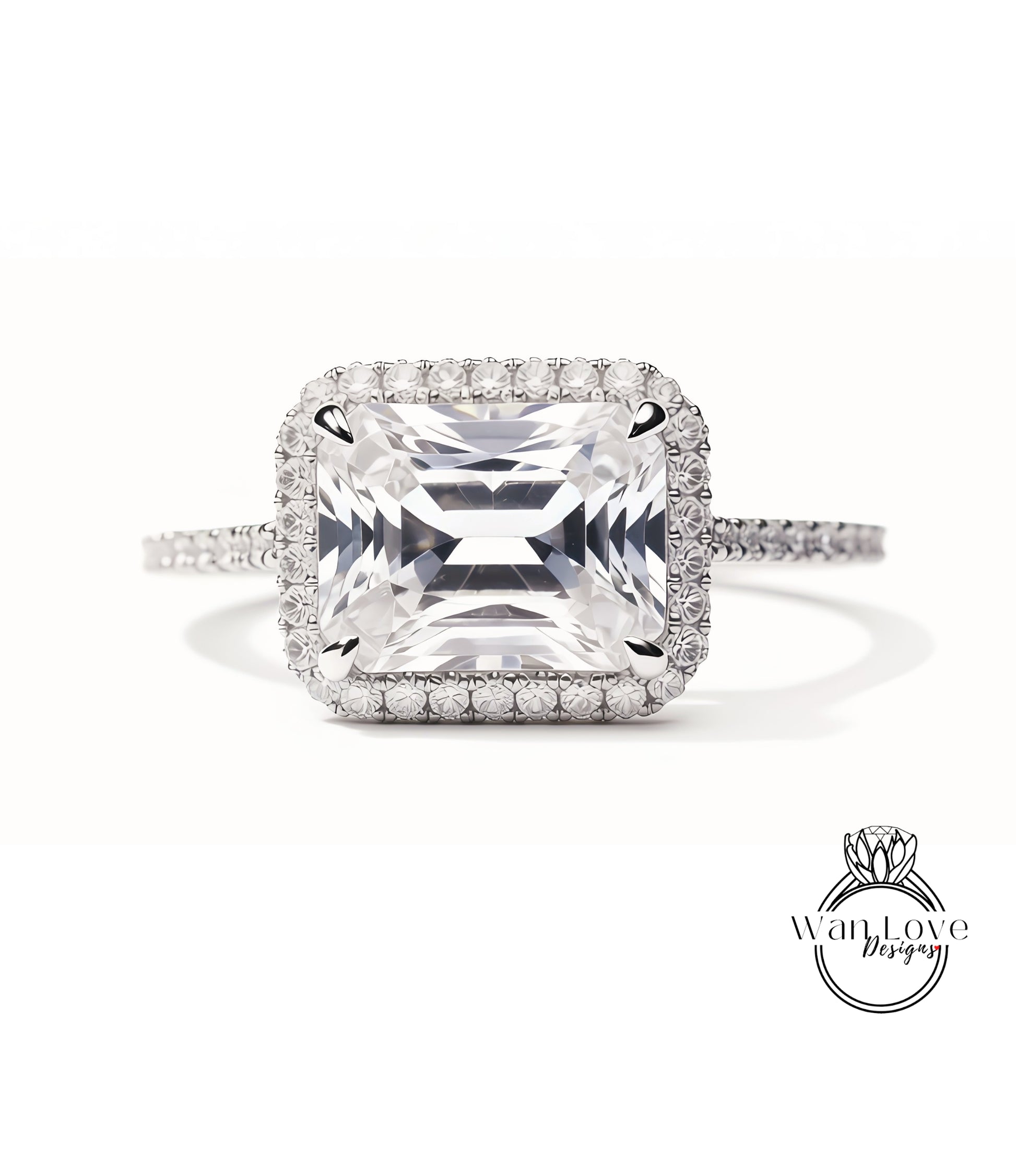 A large, square-cut diamond ring with a halo of smaller diamonds around the center stone.