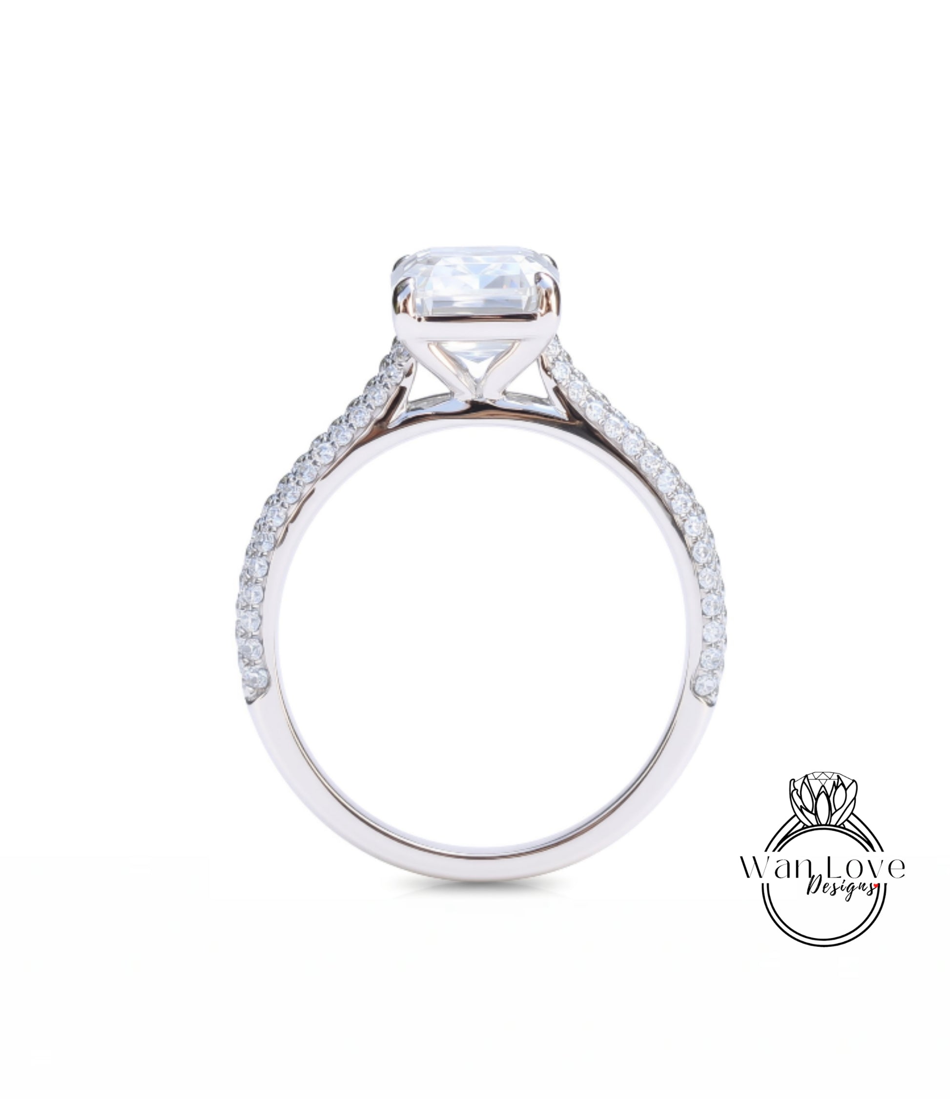 A close-up view of a diamond engagement ring with a large central diamond and smaller diamonds along the band.