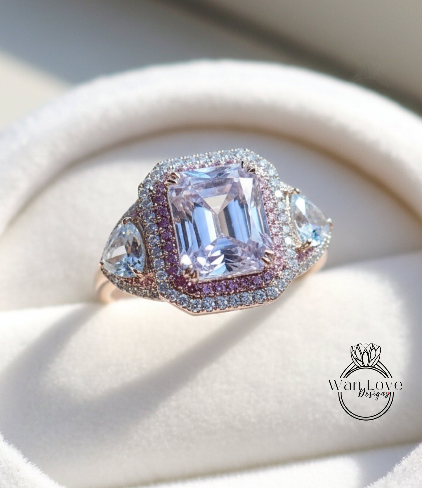 A close-up image of a beautiful engagement ring with a large, clear gemstone surrounded by smaller diamonds and set in a gold band.