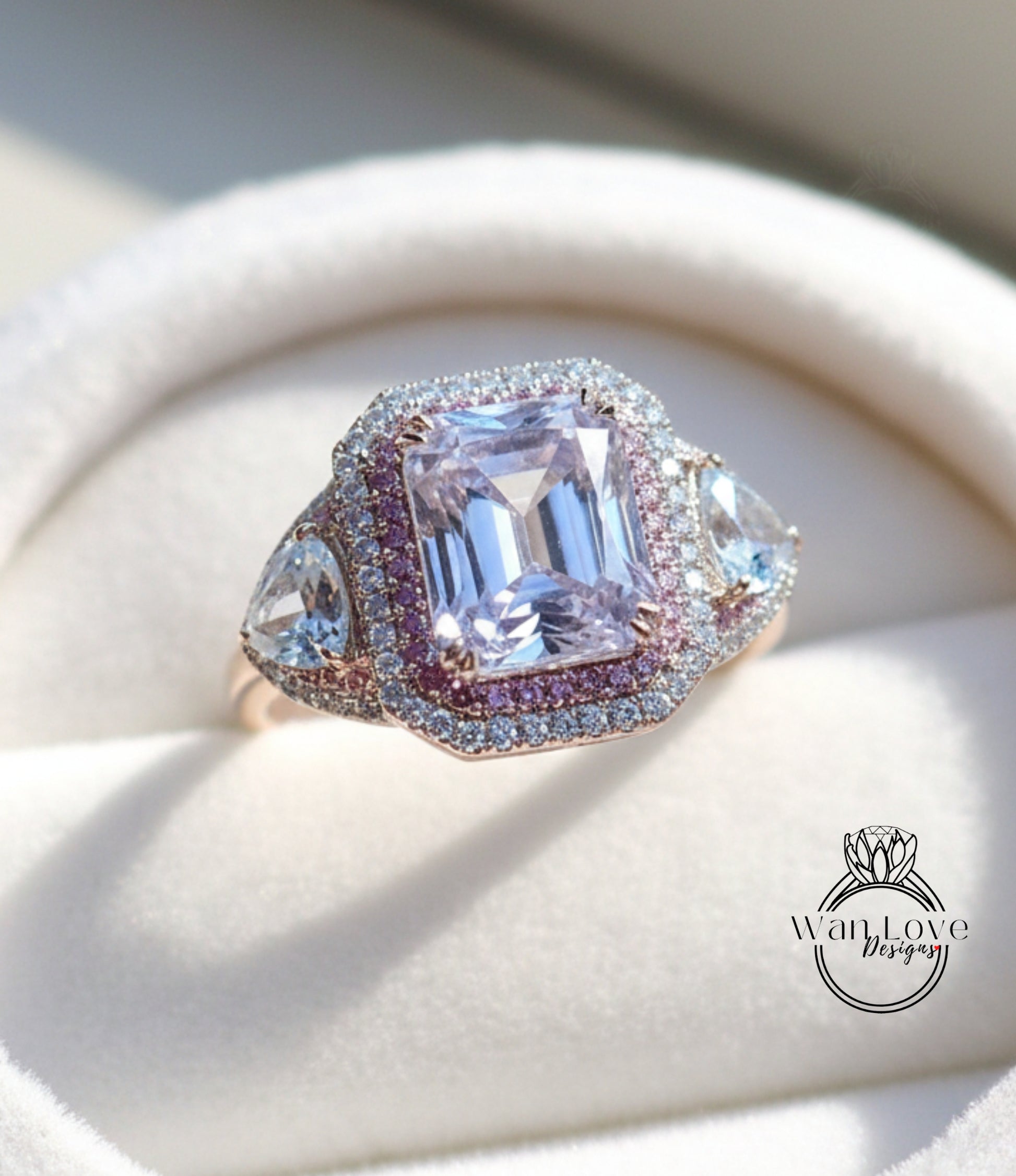 A close-up image of a beautiful engagement ring with a large, clear gemstone surrounded by smaller diamonds and set in a gold band.