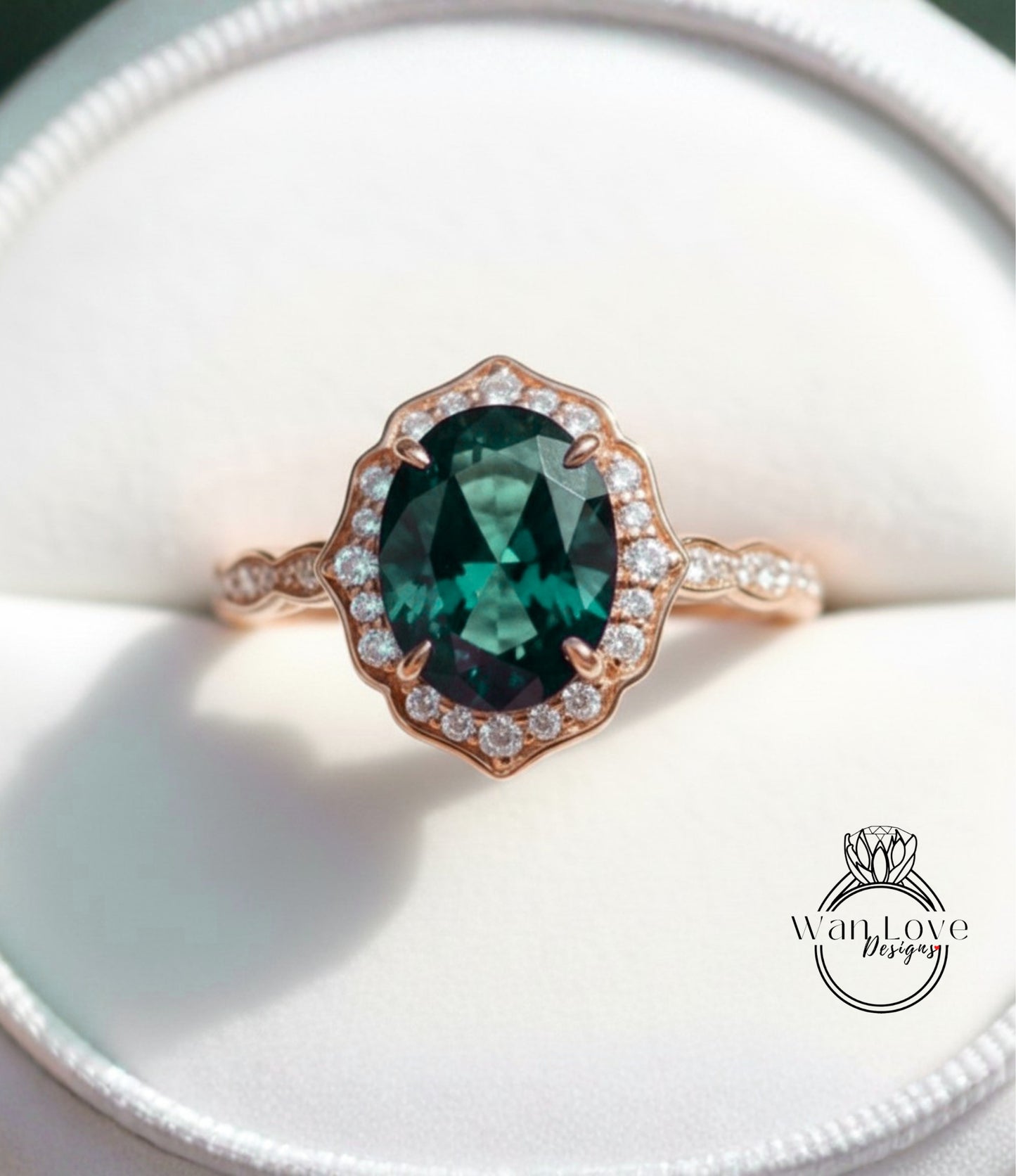 A close-up image of a rose gold ring with a large oval-shaped gemstone set in the center, surrounded by smaller diamonds.