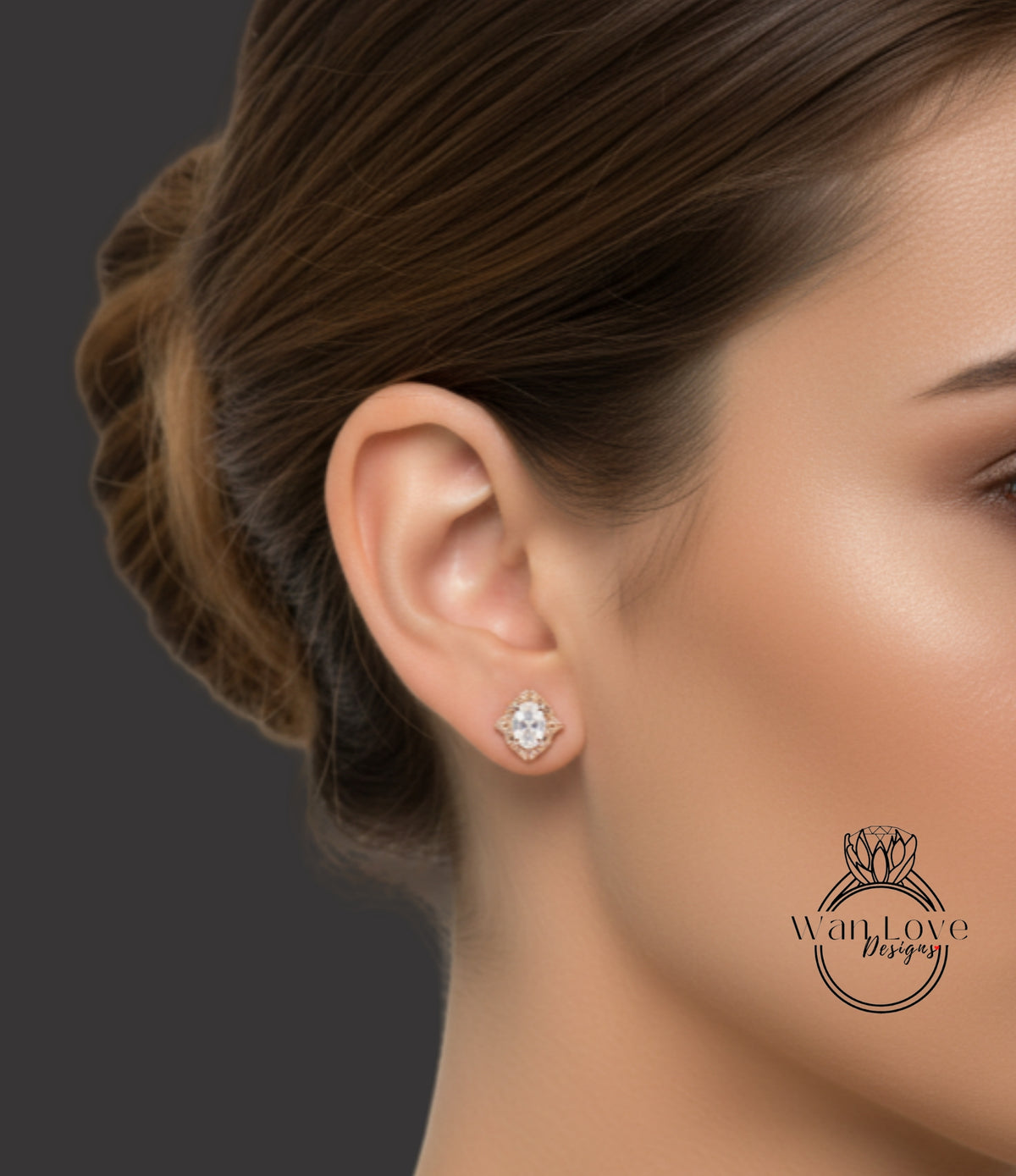 A close-up of a woman's ear with a diamond earring, against a dark background.