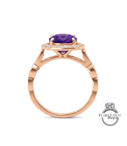 A gold ring with a large purple gemstone set in the center, surrounded by smaller diamonds.