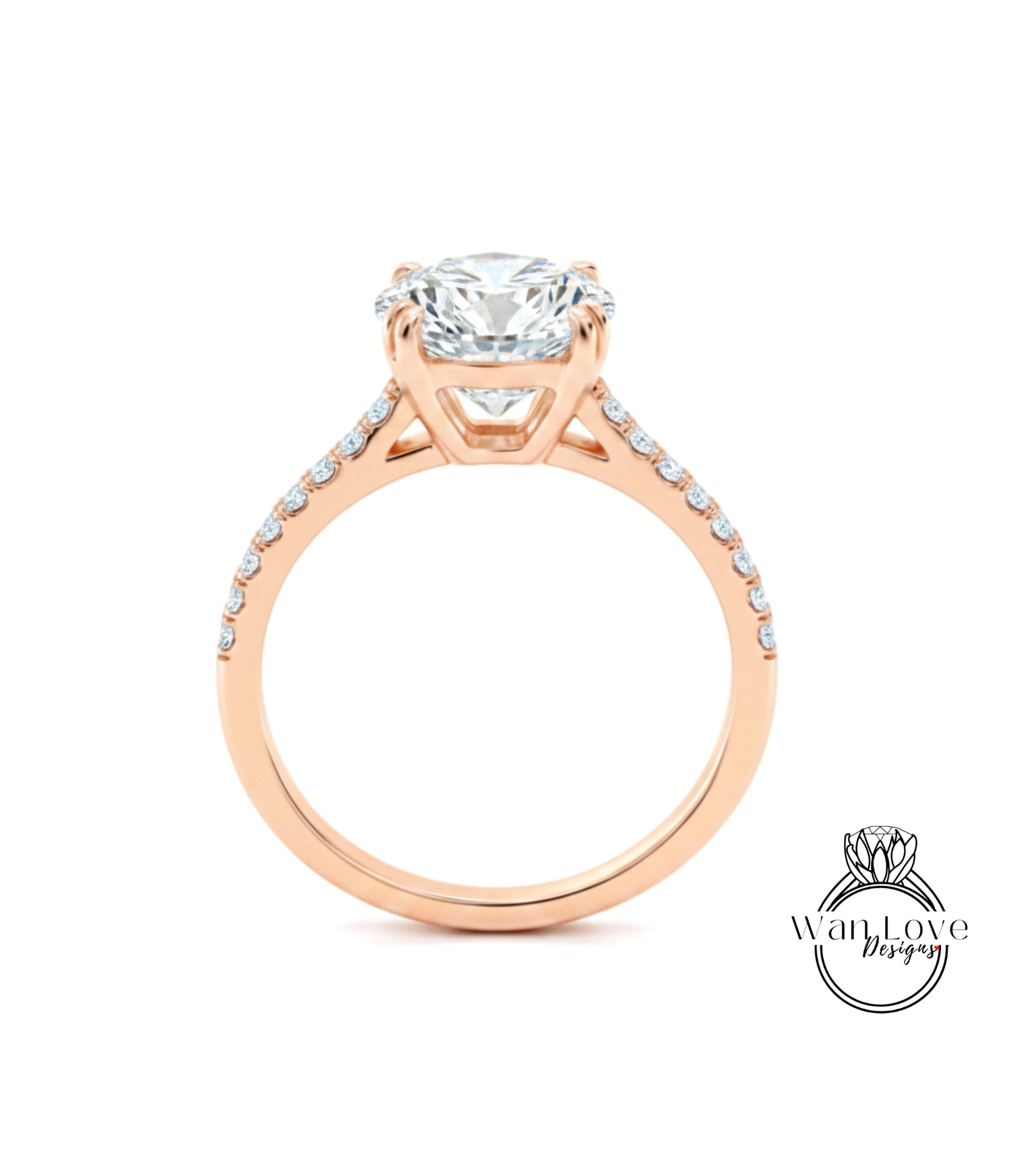 A close-up of a rose gold engagement ring with a large, round diamond set in the center.