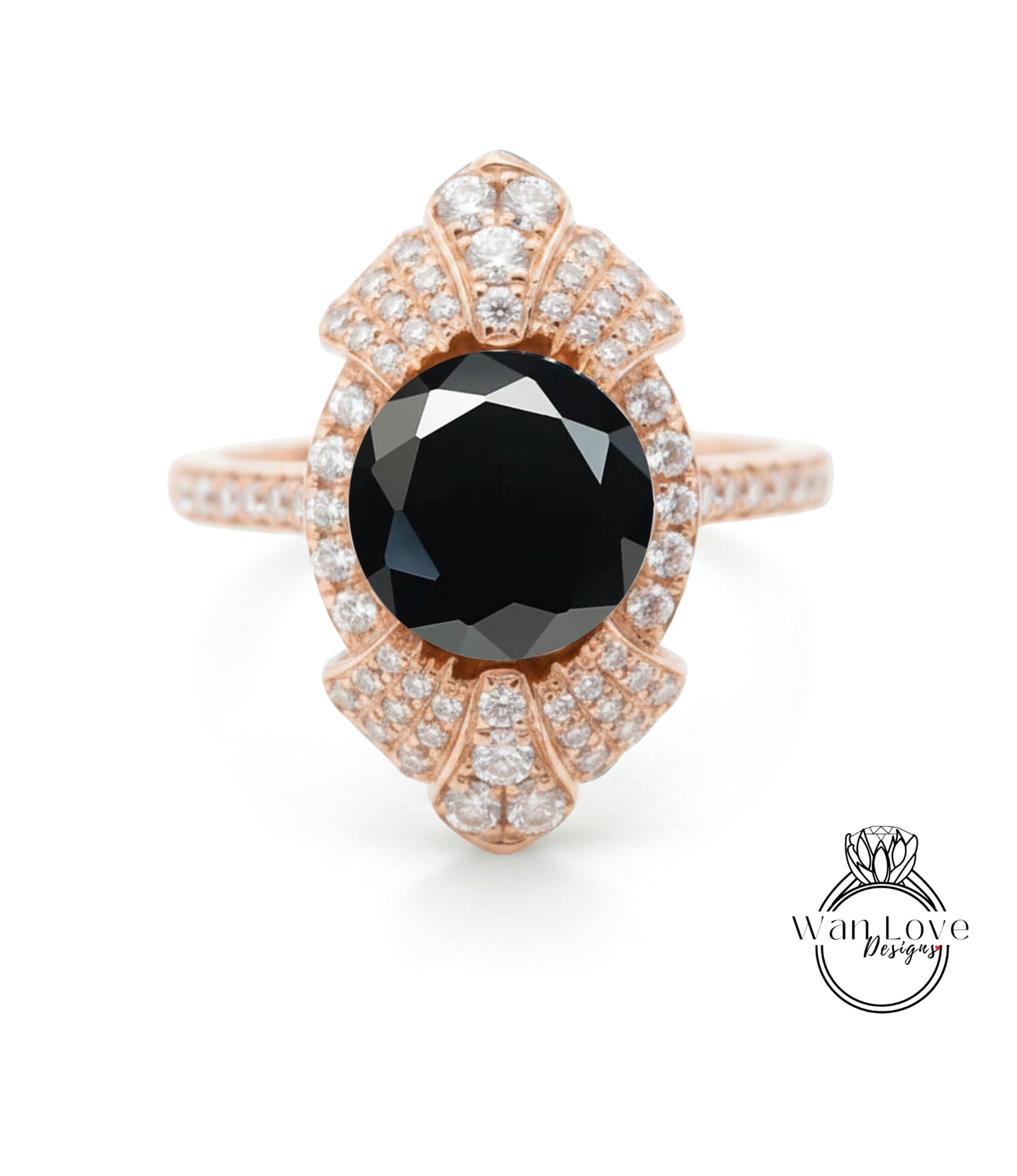 a beautiful rose gold ring with a large black diamond as the centerpiece.