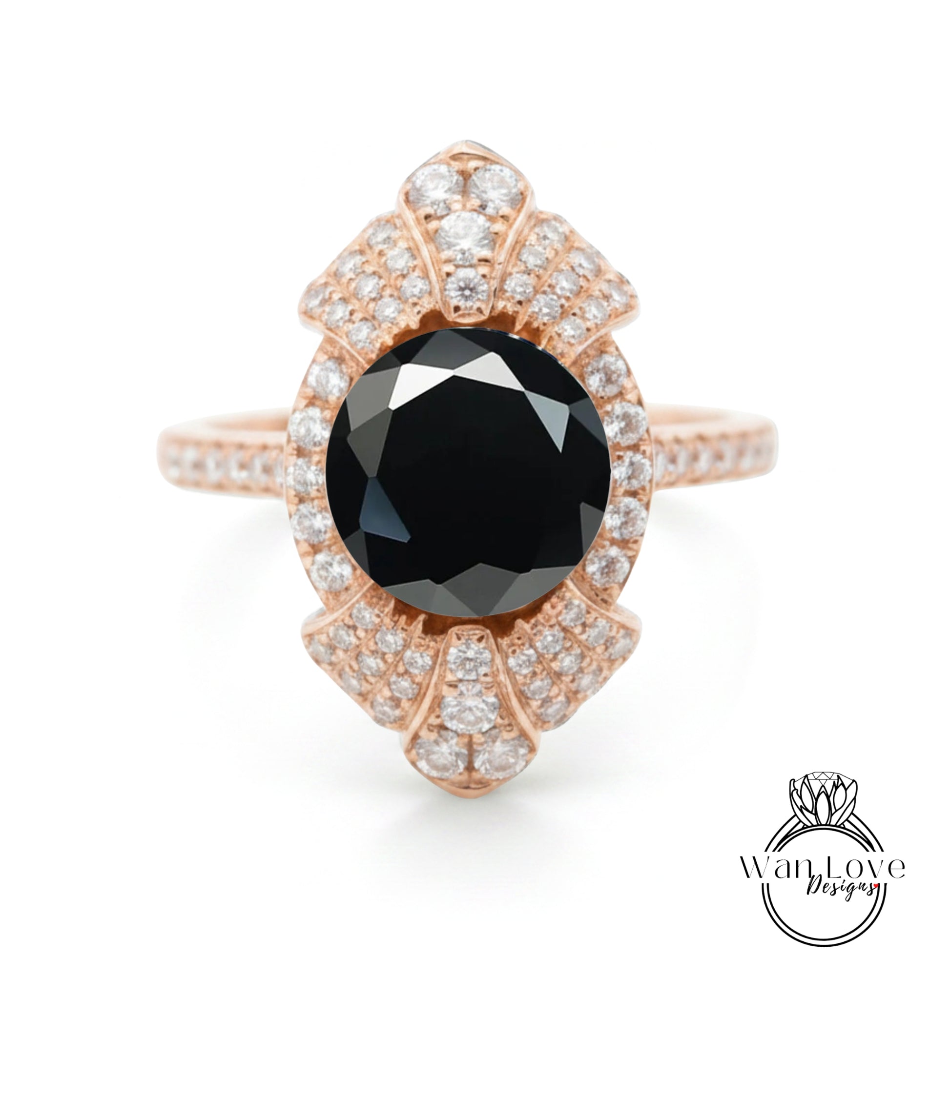 a beautiful rose gold ring with a large black diamond as the centerpiece.