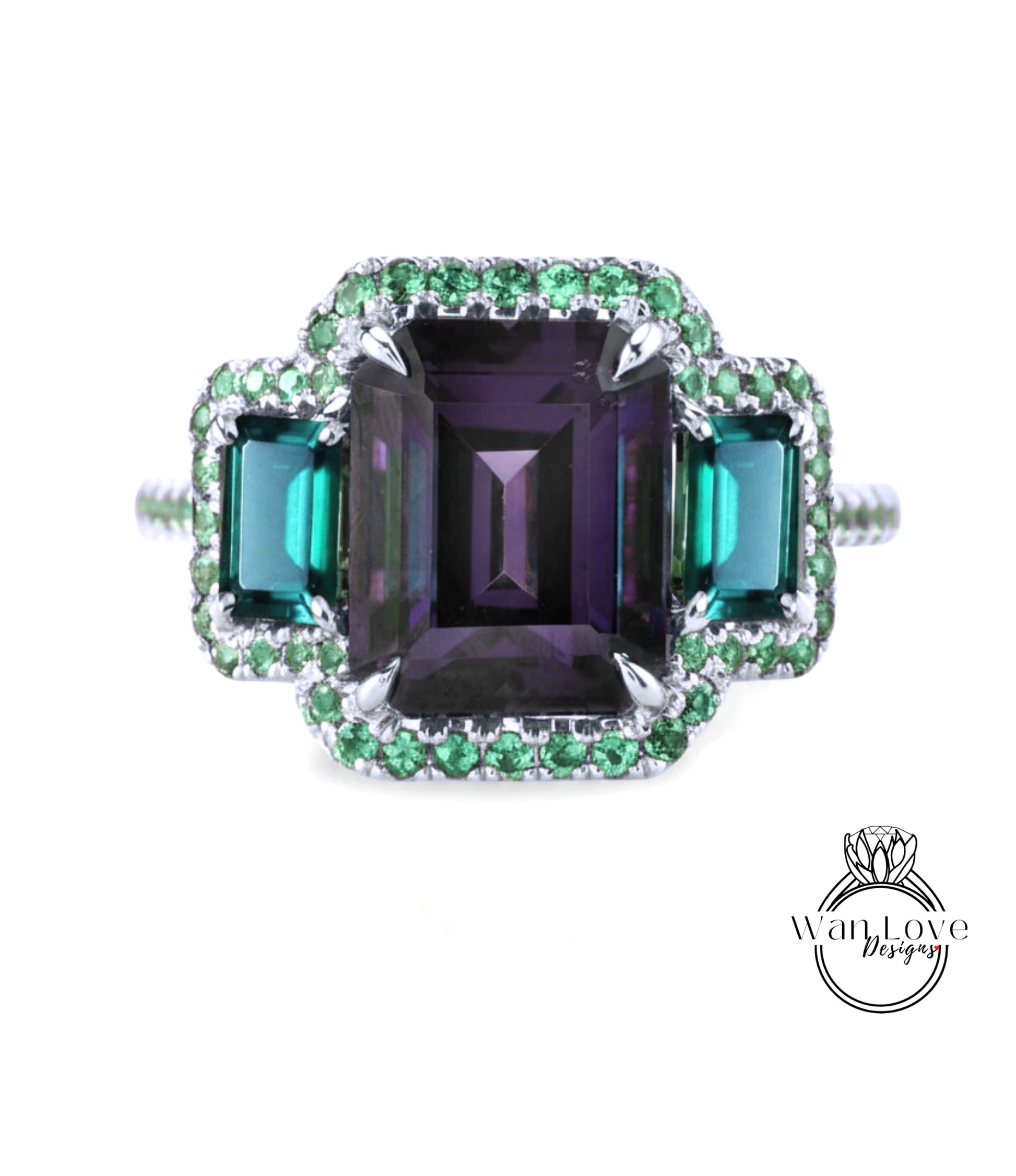 A ring with a large purple gemstone surrounded by smaller green gemstones, set in a silver band with a sparkling design.
