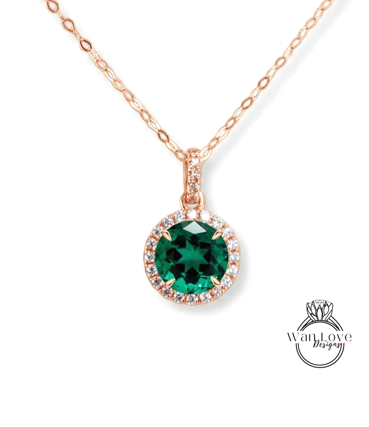 A necklace with a large, green gemstone pendant surrounded by smaller diamonds.