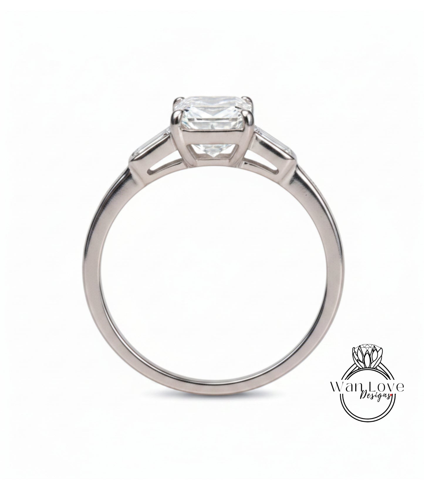 A silver engagement ring with a large diamond set in the center.