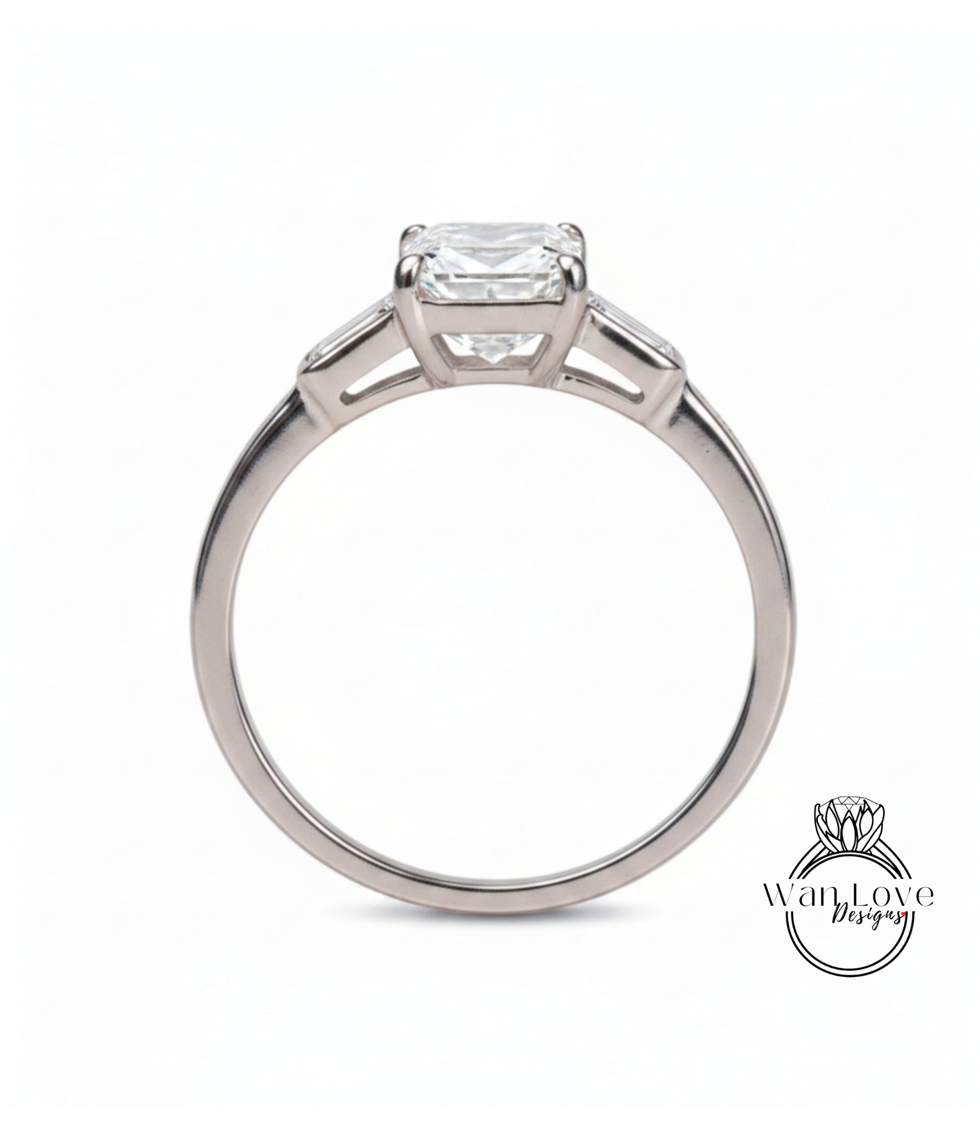 A silver engagement ring with a large diamond set in the center.