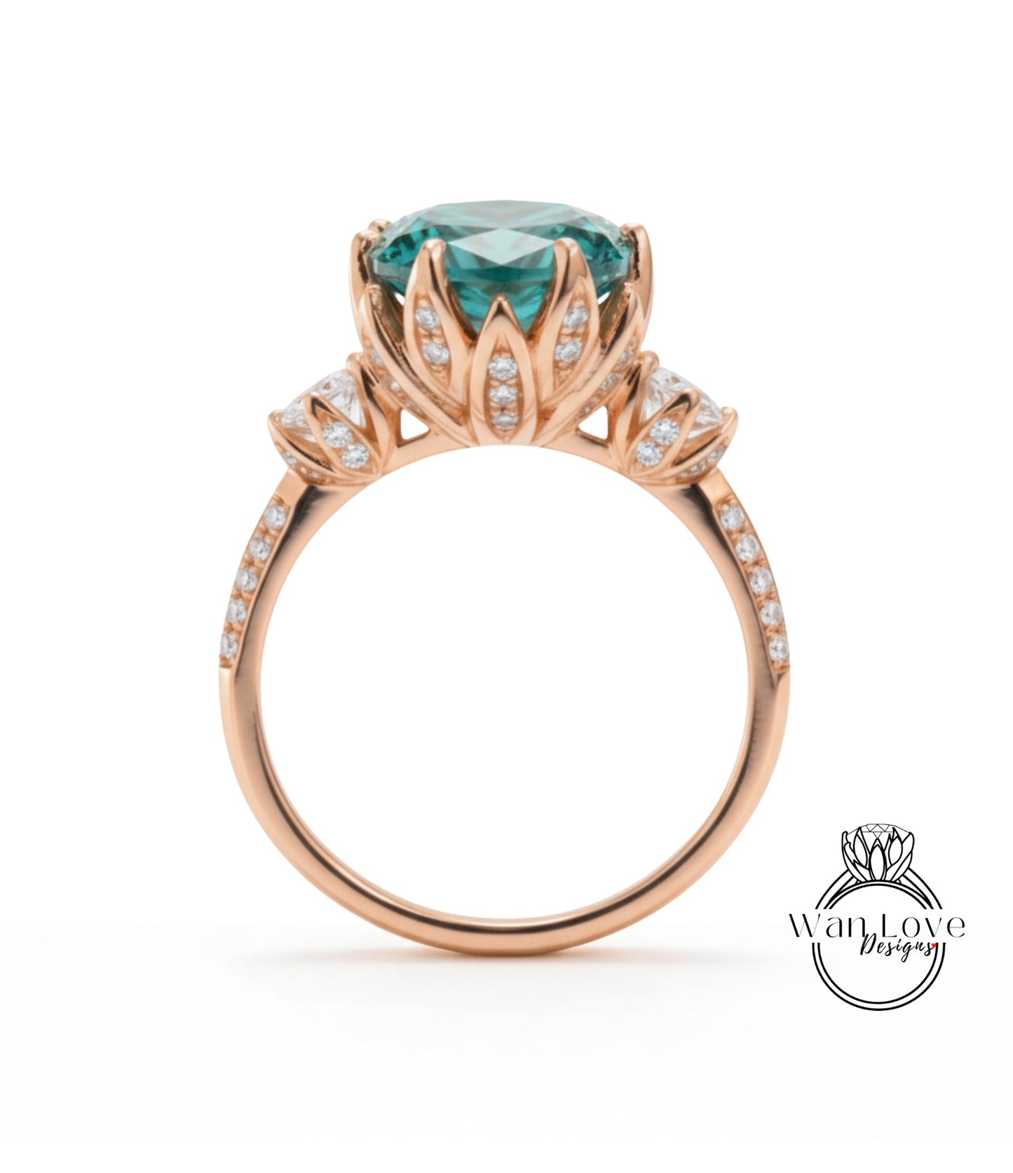 A gold ring with a large blue gemstone, likely a sapphire, surrounded by smaller diamonds and a delicate flower-like design.