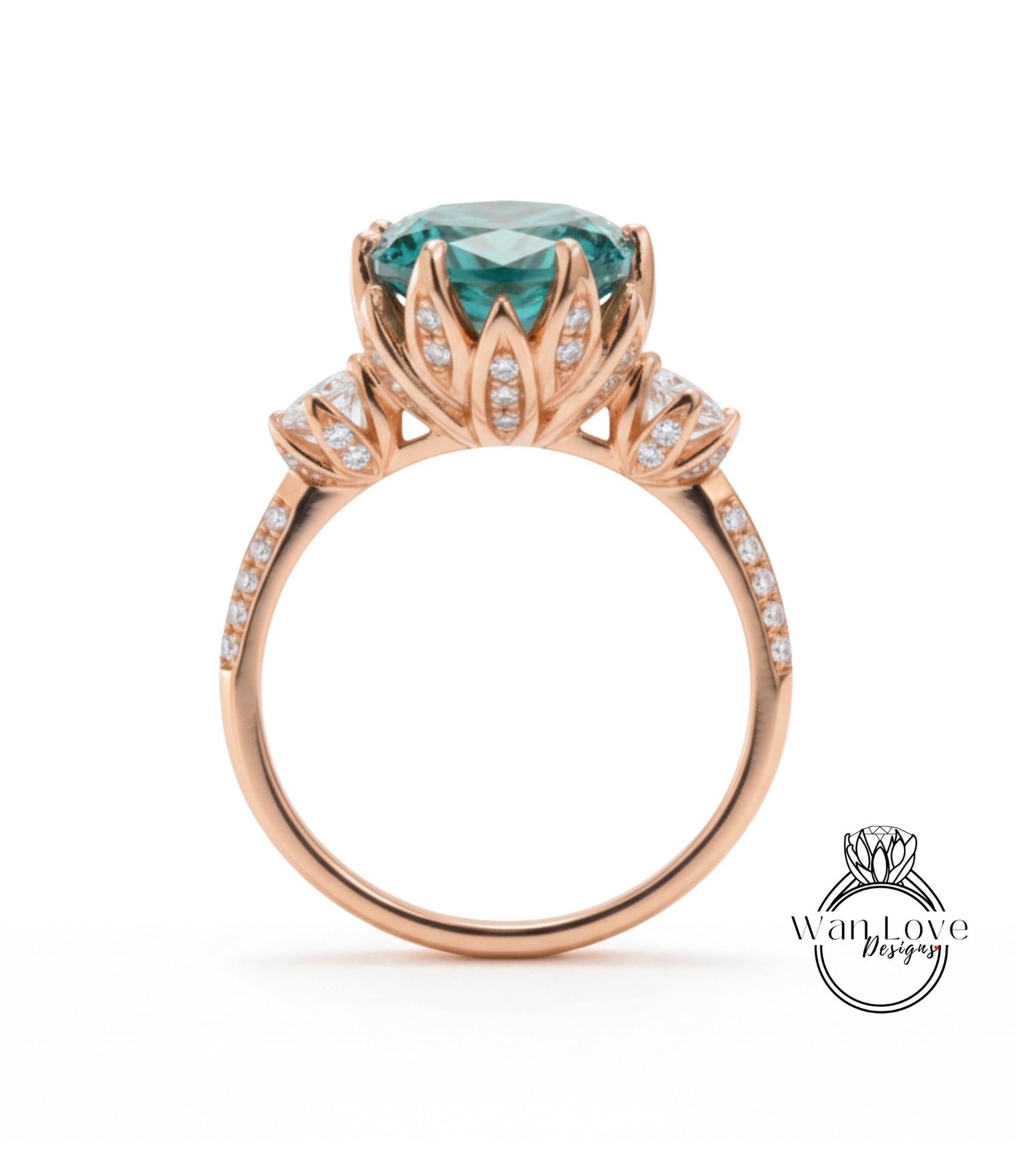 A gold ring with a large blue gemstone, likely a sapphire, surrounded by smaller diamonds and a delicate flower-like design.