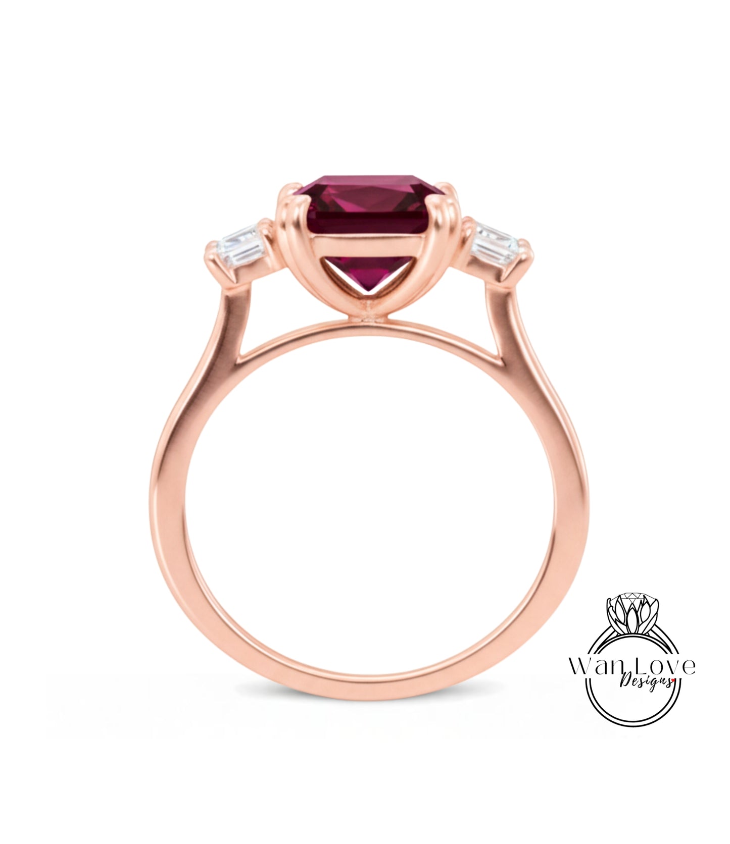 A rose gold ring with a large, deep red gemstone set in the center, surrounded by smaller diamonds.
