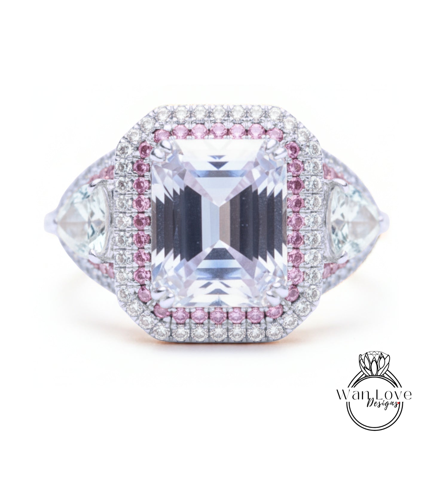 A large, clear gemstone ring with a halo of smaller diamonds around it, set in a silver and pink metal band.