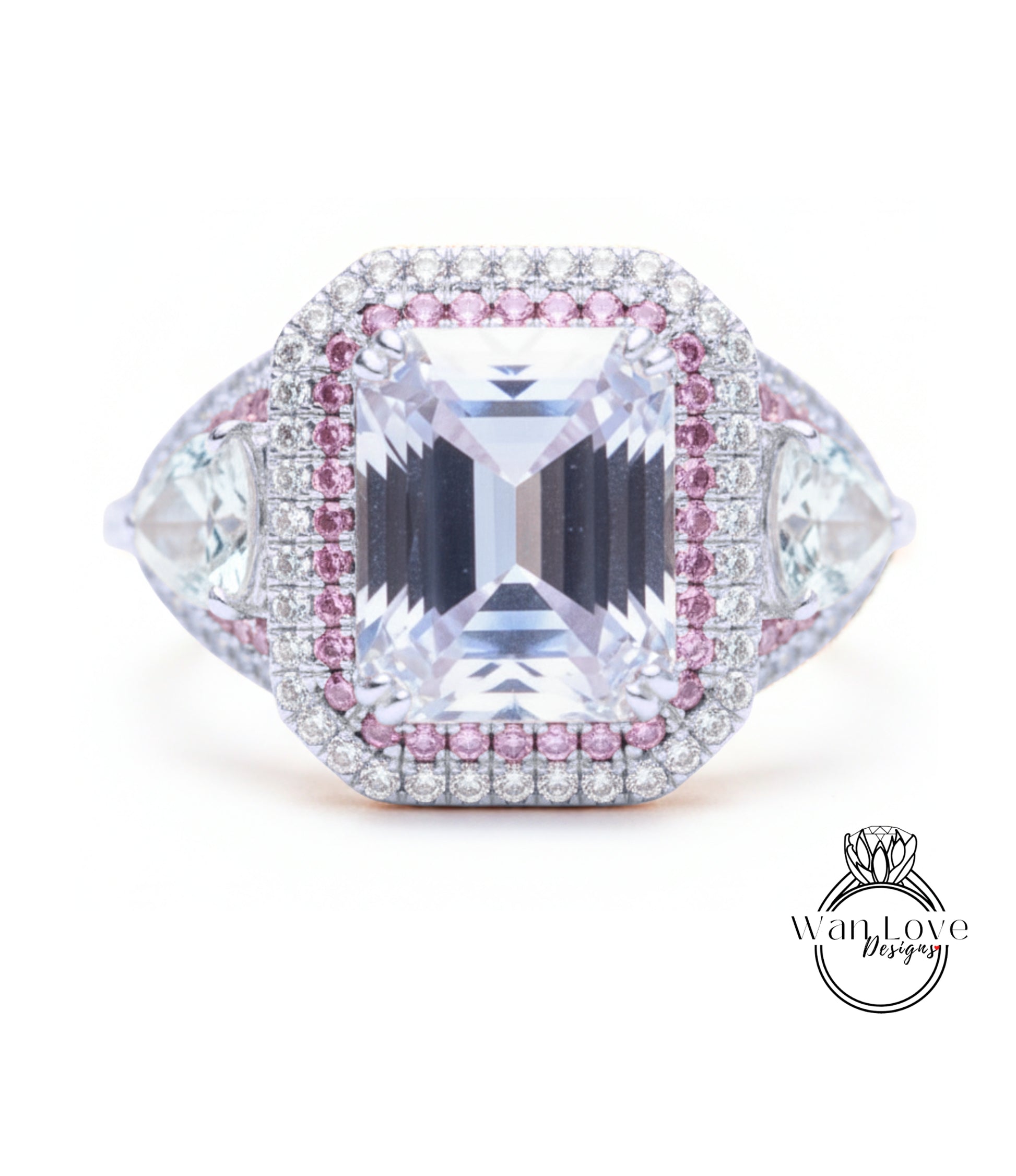 A large, clear gemstone ring with a halo of smaller diamonds around it, set in a silver and pink metal band.