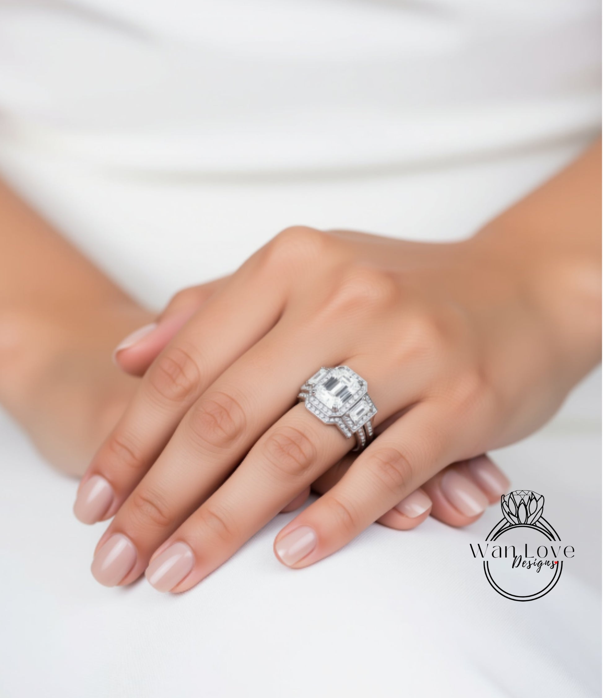 A close-up of a person's hand wearing a large, sparkling diamond ring.