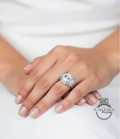 A close-up of a person's hand wearing a large, sparkling diamond ring.