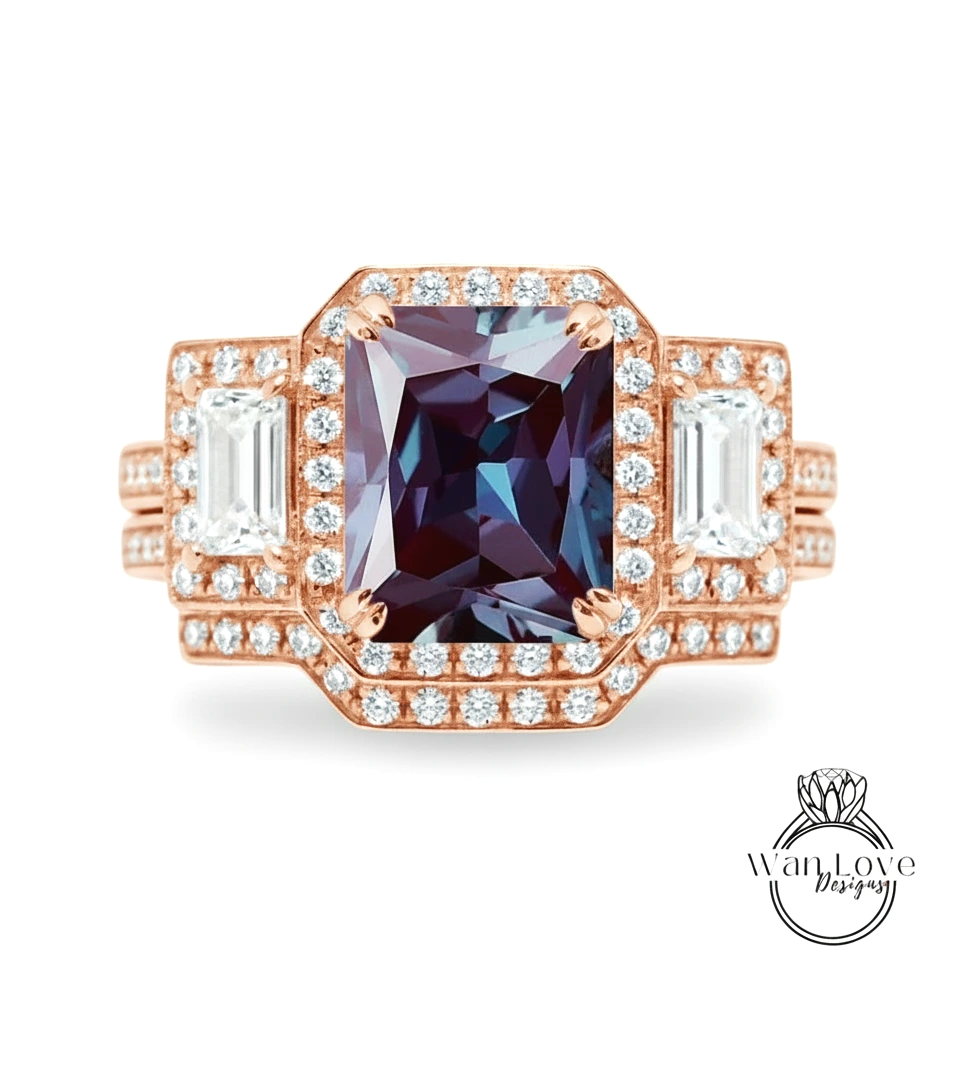 a stunning engagement ring with a large, deep blue gemstone surrounded by smaller diamonds.