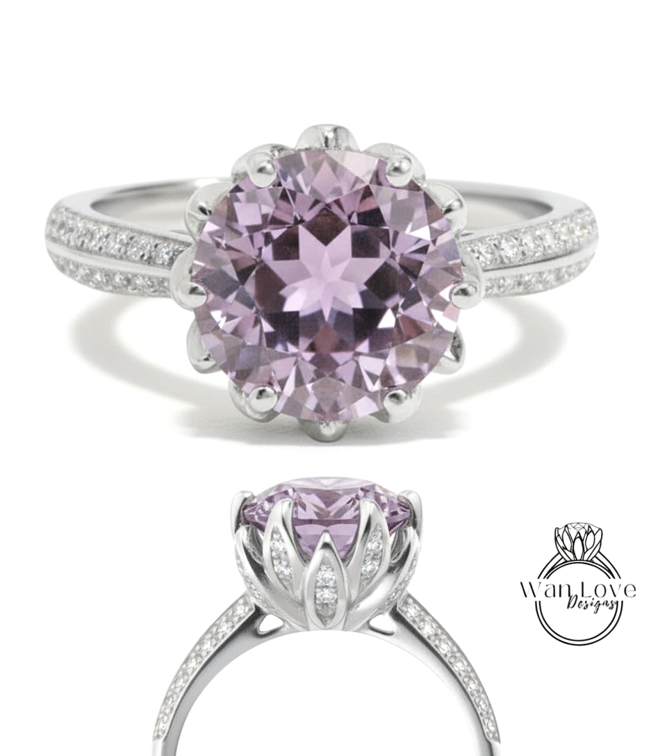 A stunning ring featuring a large, round purple gemstone set in a silver band adorned with small diamonds.