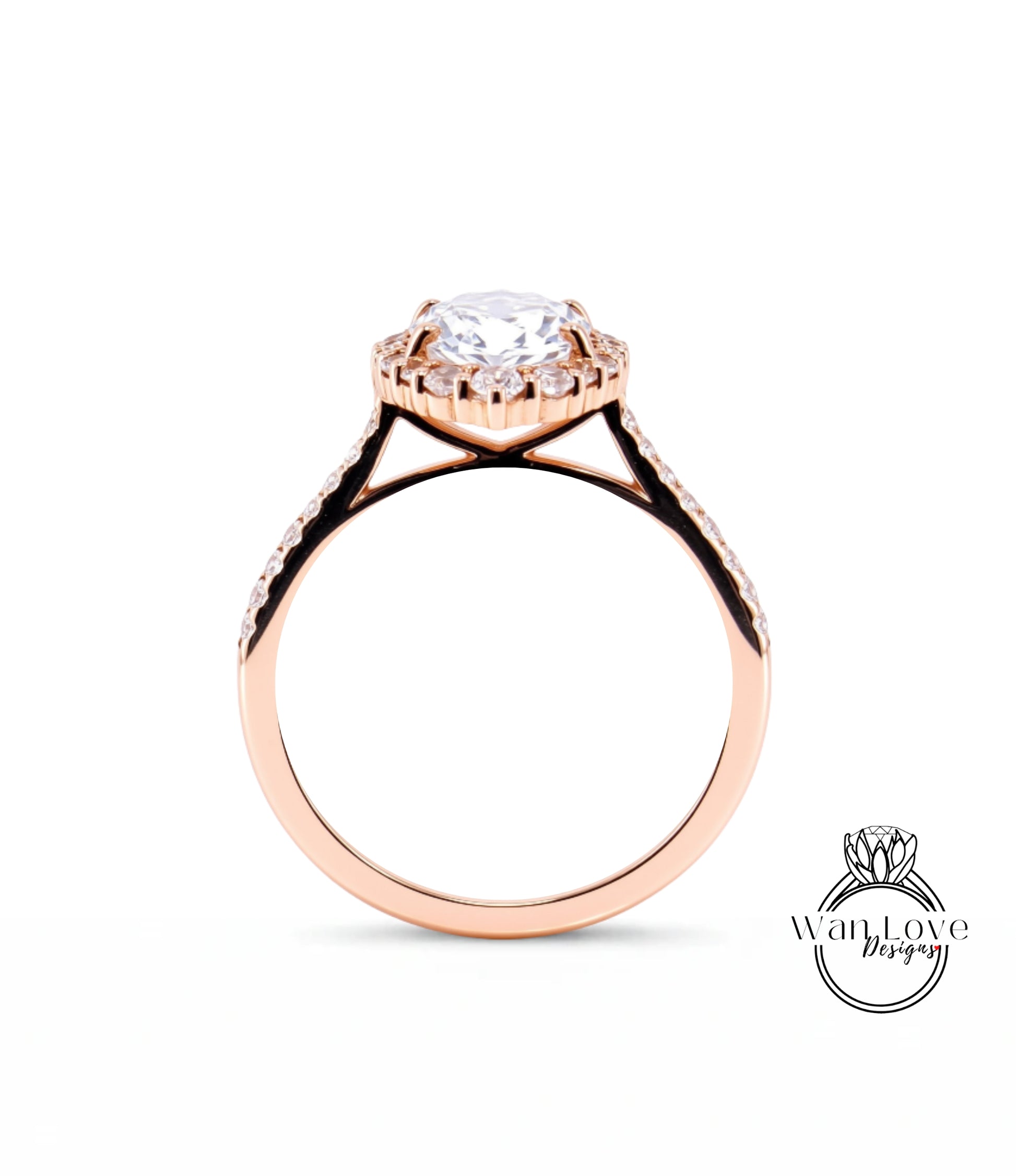 A rose gold engagement ring with a large central diamond and smaller diamonds around the halo.
