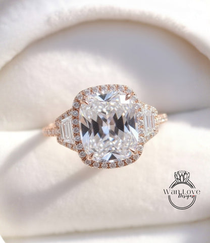 A close-up image of a beautiful diamond engagement ring with a large central diamond surrounded by smaller diamonds and a halo of smaller diamonds around the center.