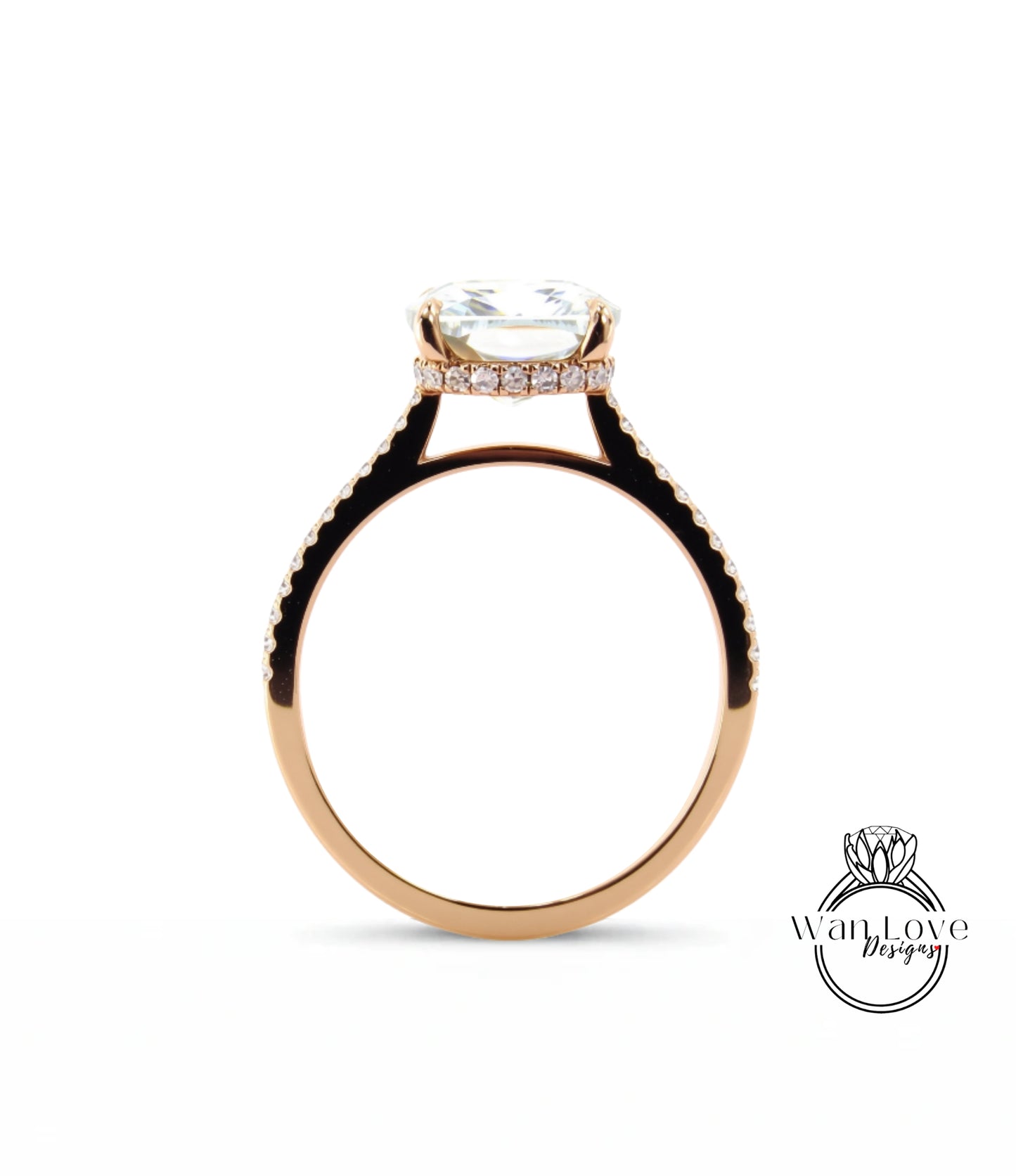 A gold ring with a large diamond set in the center, showcasing the intricate design and craftsmanship of the piece.