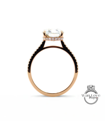 A gold ring with a large diamond set in the center, showcasing the intricate design and craftsmanship of the piece.