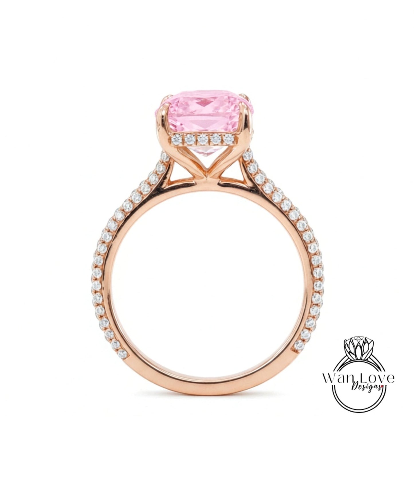 A beautiful rose gold engagement ring with a large, clear gemstone set in the center.