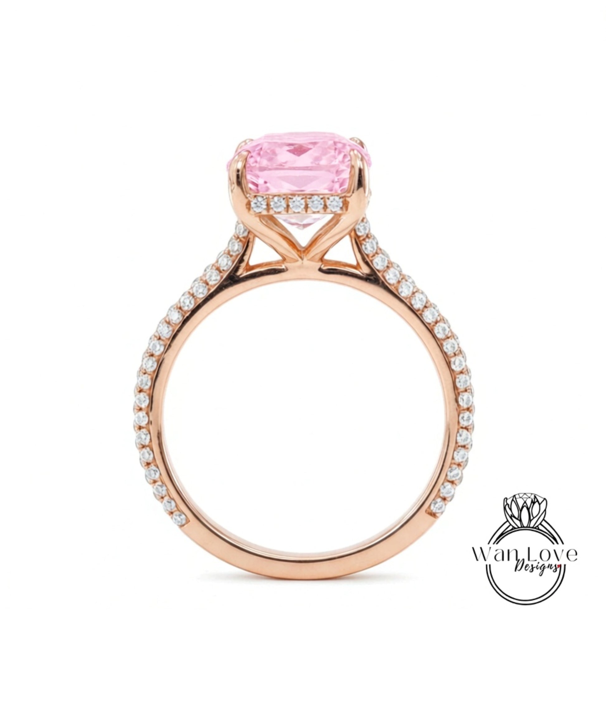 A beautiful rose gold engagement ring with a large, clear gemstone set in the center.
