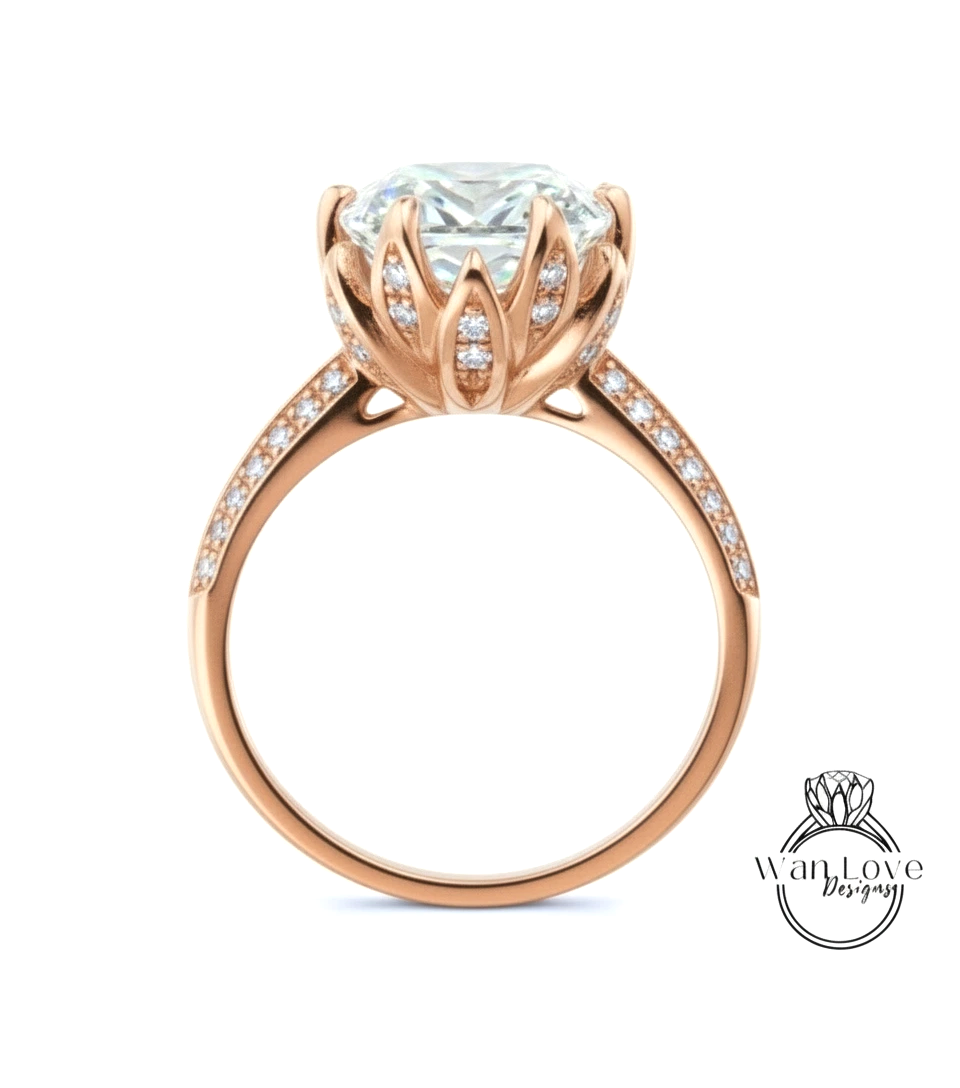 A beautiful rose gold engagement ring with a large, round diamond set in the center, surrounded by smaller diamonds.