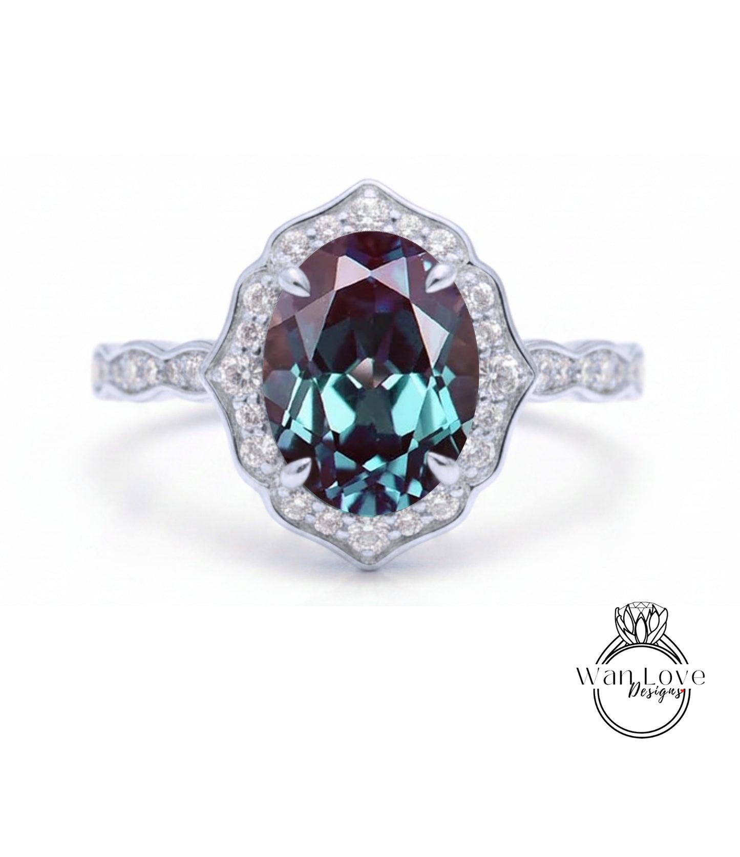 A stunning ring featuring a large oval-shaped gemstone surrounded by a halo of smaller diamonds, set in a silver band.