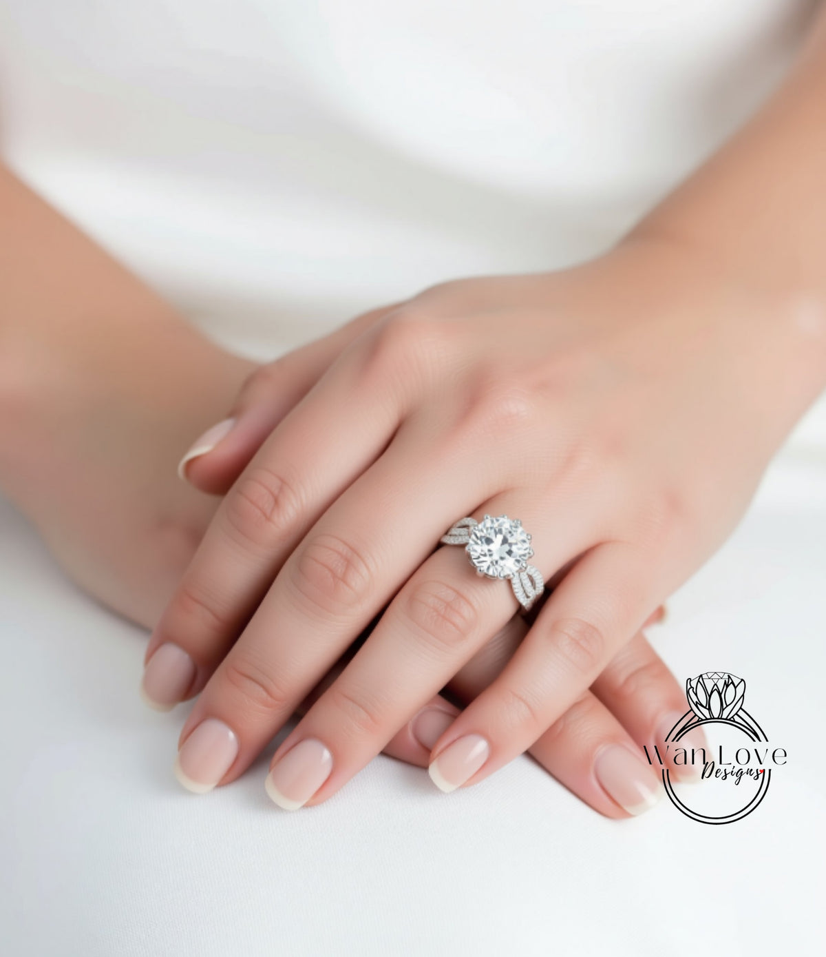 A close-up of a person's hands wearing a large, sparkling diamond engagement ring.