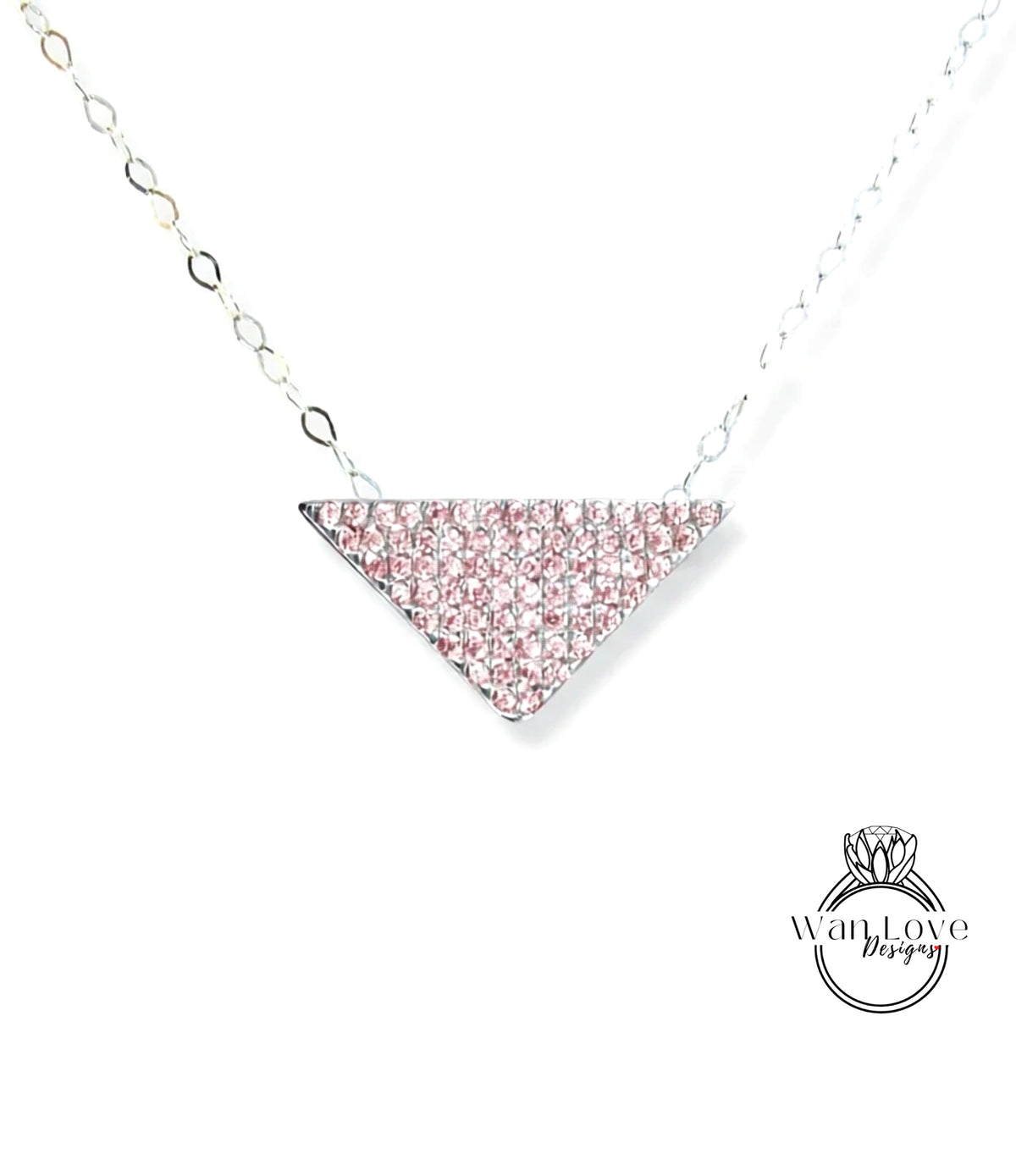A necklace with a triangular pendant made of pink diamonds.