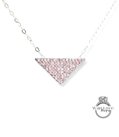 A necklace with a triangular pendant made of pink diamonds.