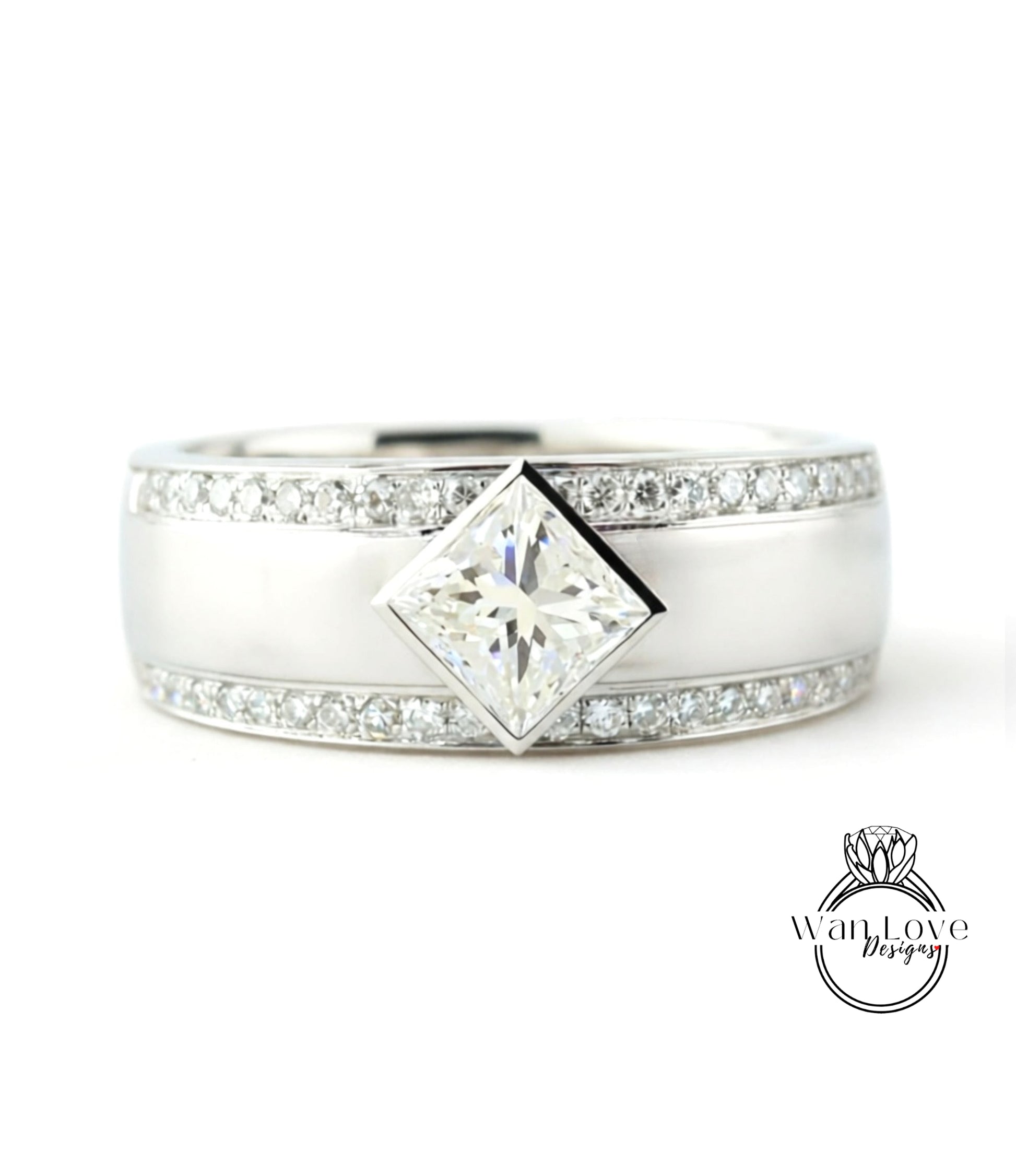 A silver ring with a large diamond set in the center, surrounded by smaller diamonds along the band.