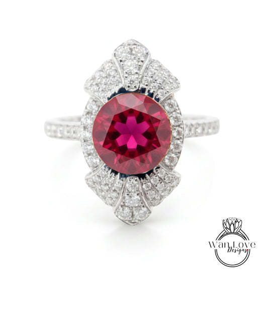 A stunning ring featuring a large, deep red gemstone surrounded by a sparkling diamond-encrusted design.
