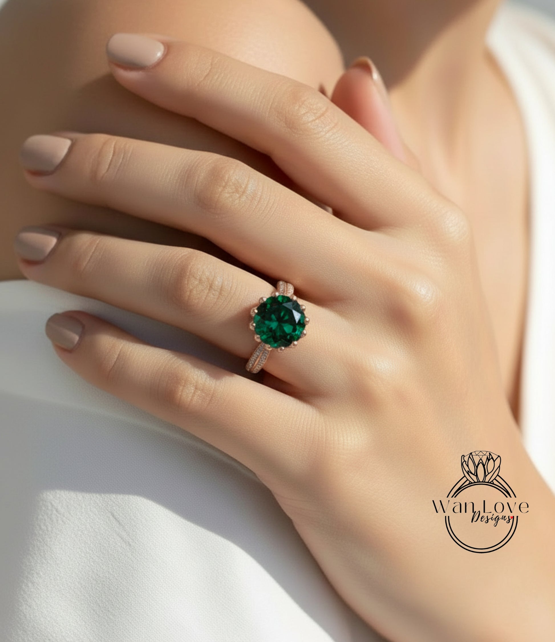A close-up of a person's hand wearing a large, green gemstone ring.