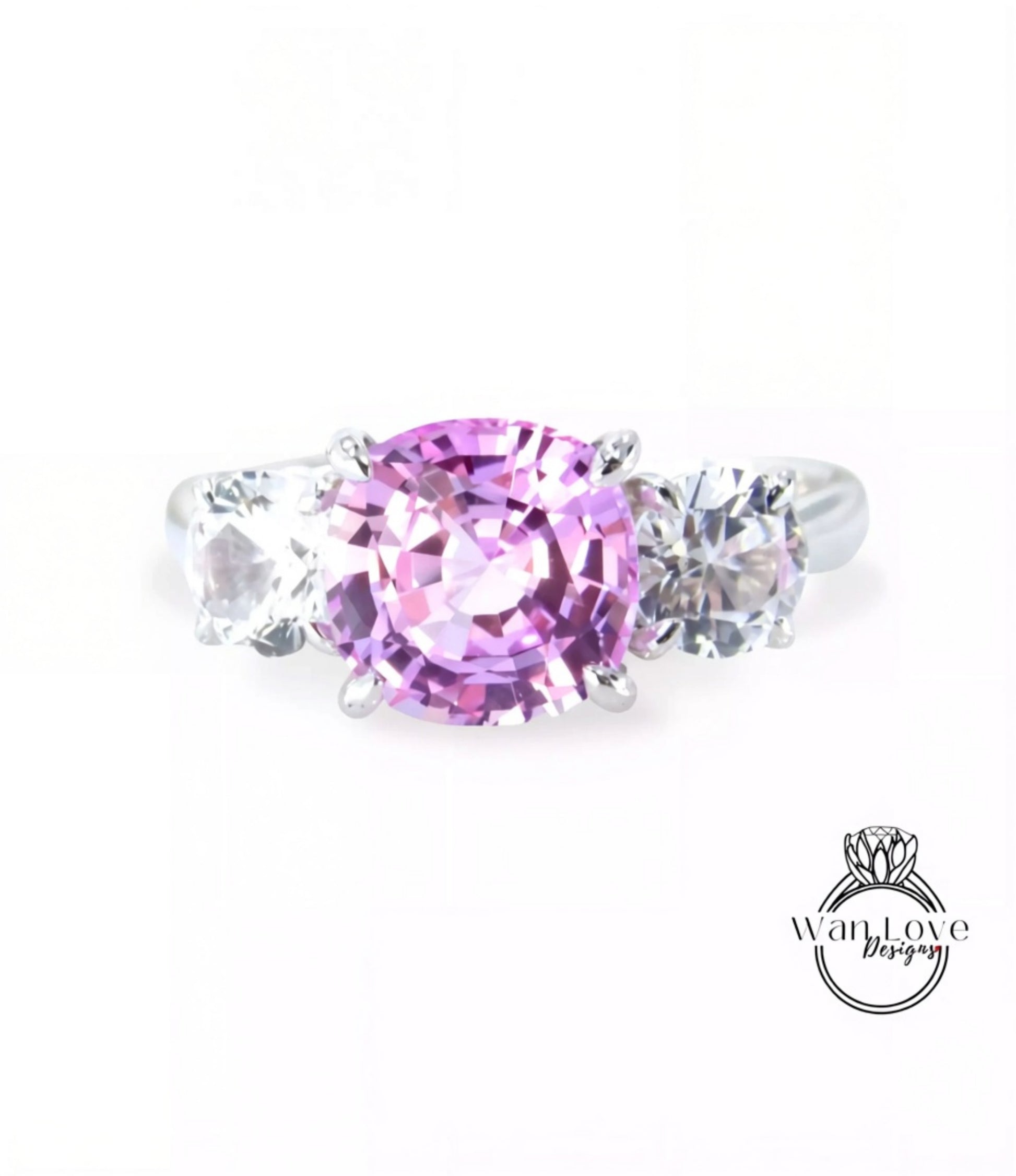 A ring with a large pink gemstone surrounded by smaller clear gemstones.