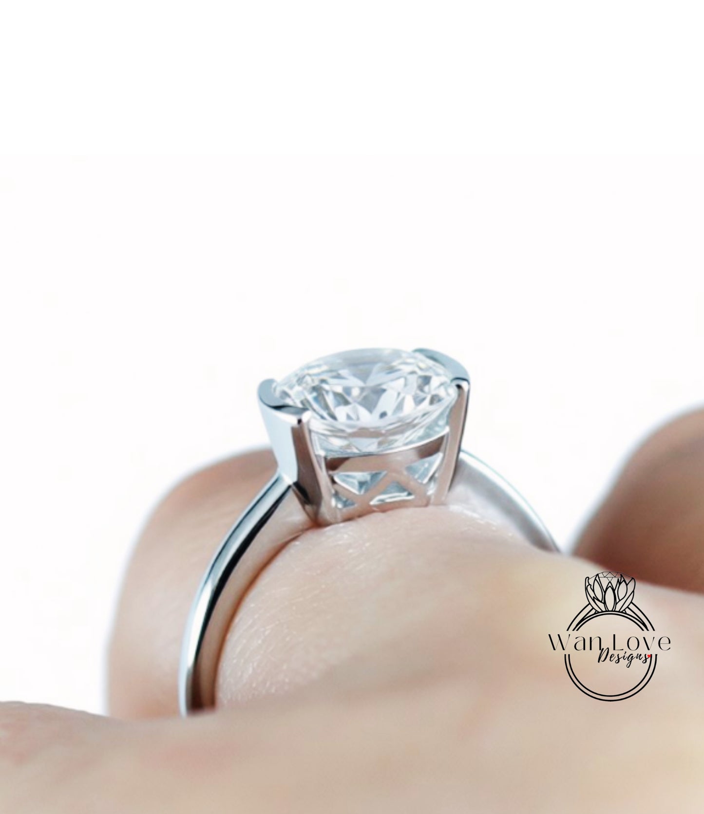 A close-up of a person's hand wearing a large, diamond-encrusted ring.