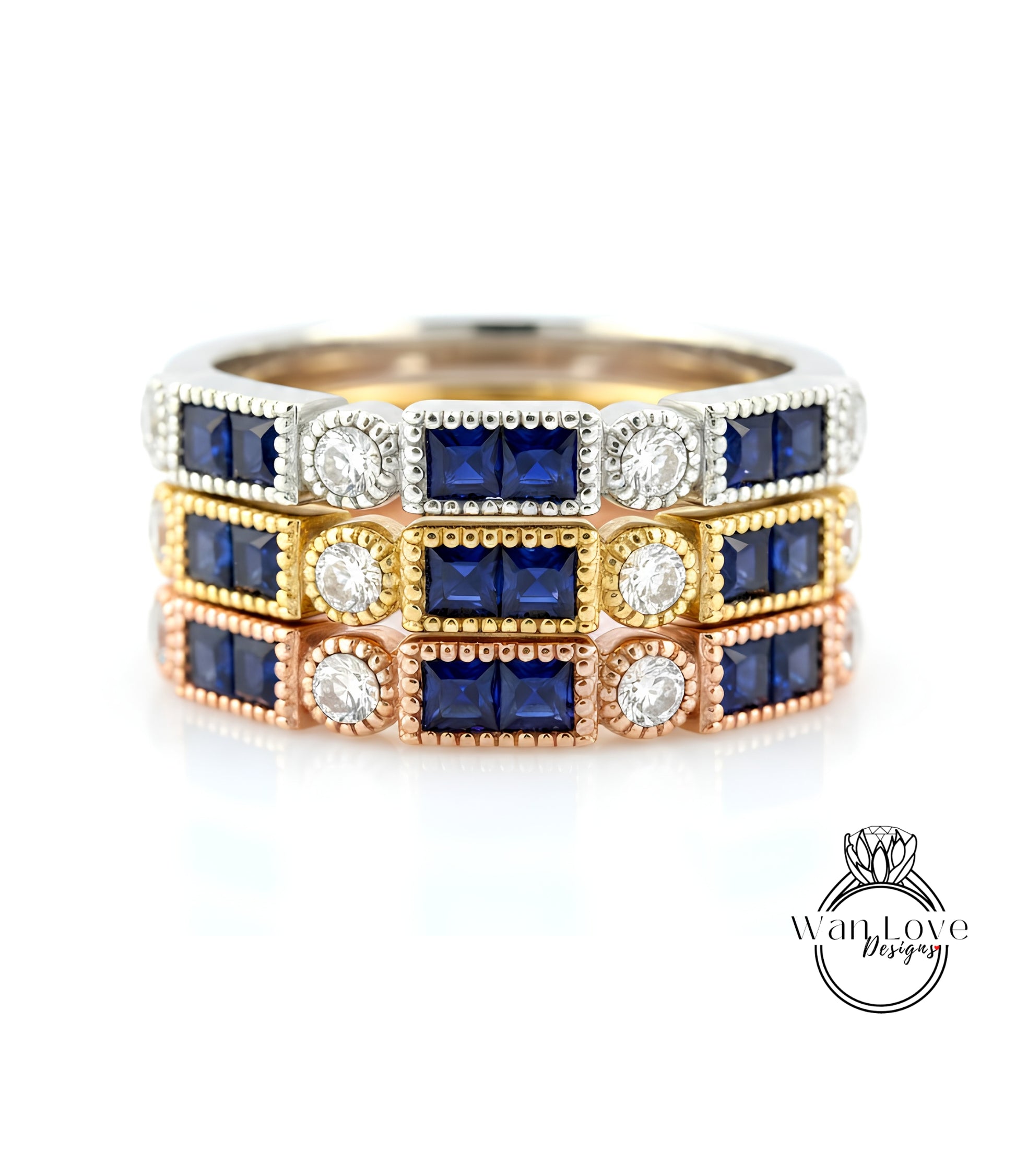 A ring with three concentric bands, each adorned with a blue gemstone and a diamond. The gemstones are arranged in a repeating pattern, creating a visually appealing design.