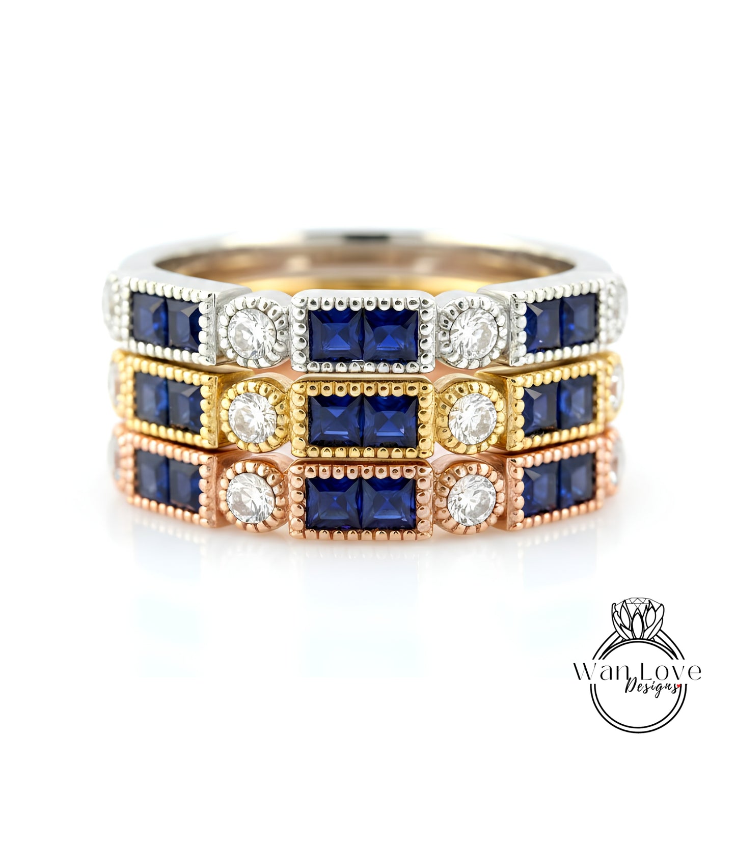 A ring with three concentric bands, each adorned with a blue gemstone and a diamond. The gemstones are arranged in a repeating pattern, creating a visually appealing design.