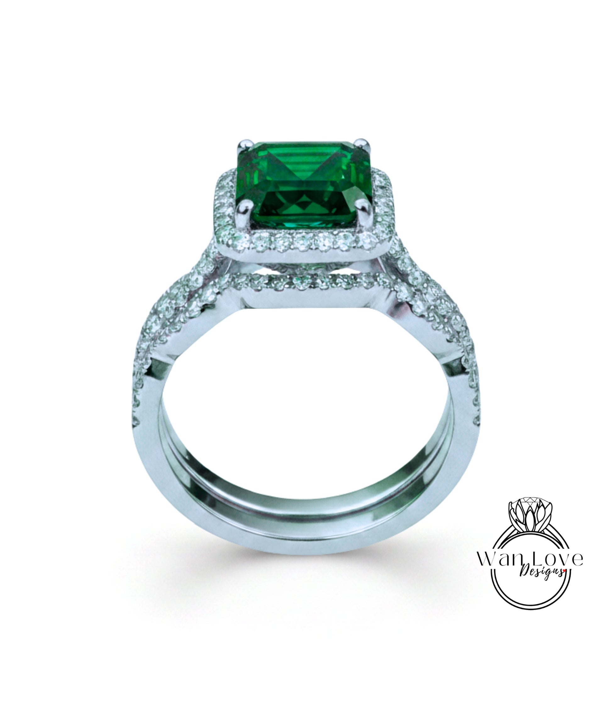 A silver ring with a large, square-cut green gemstone set in a halo of smaller diamonds.