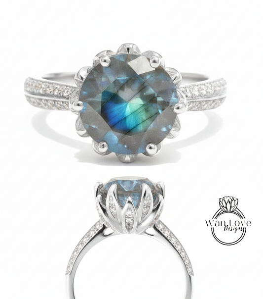 A silver ring with a large blue gemstone, likely a blue topaz, surrounded by smaller diamonds.