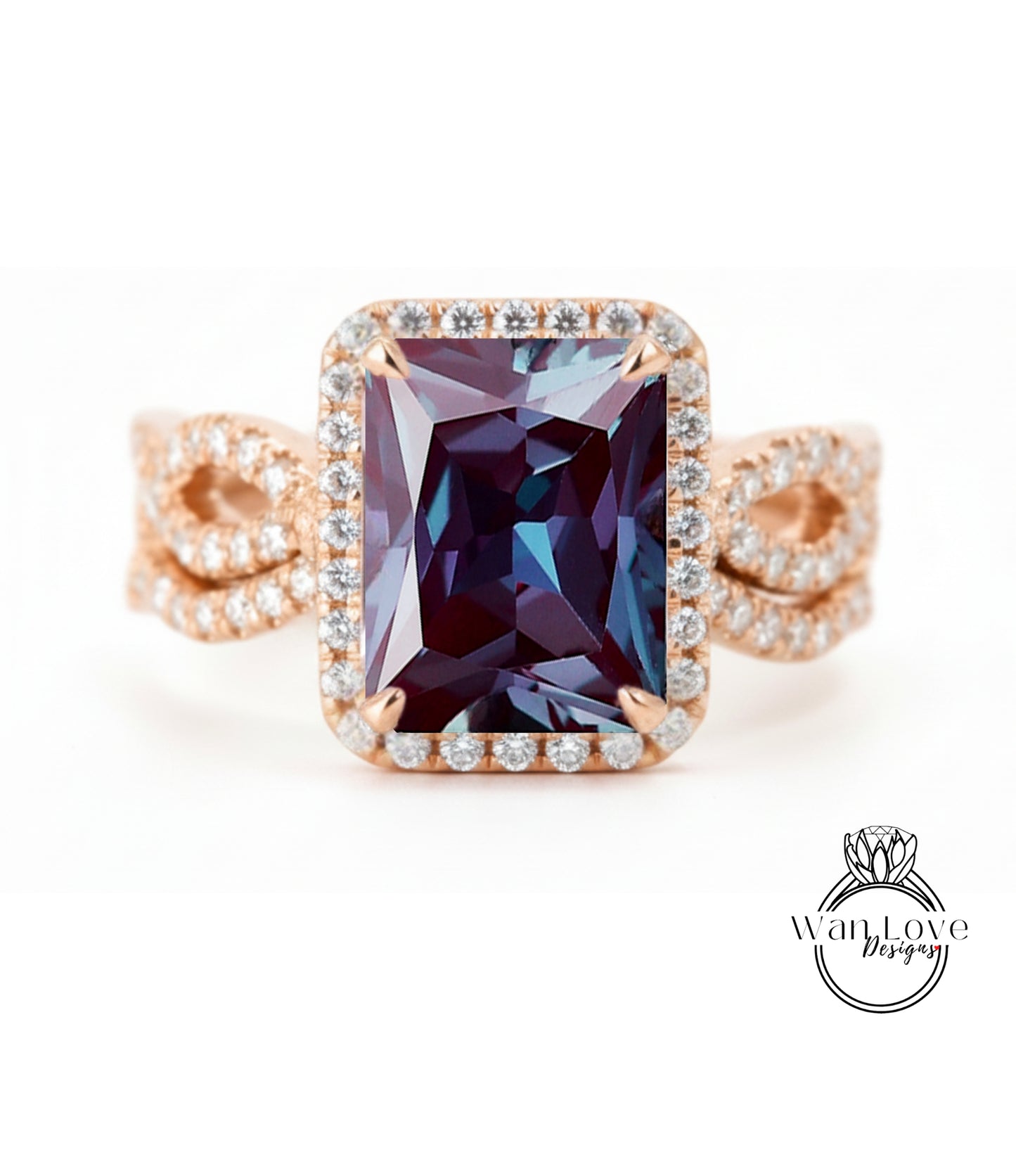 A large, rectangular purple gemstone set in a gold ring with a halo of smaller diamonds around the edges.