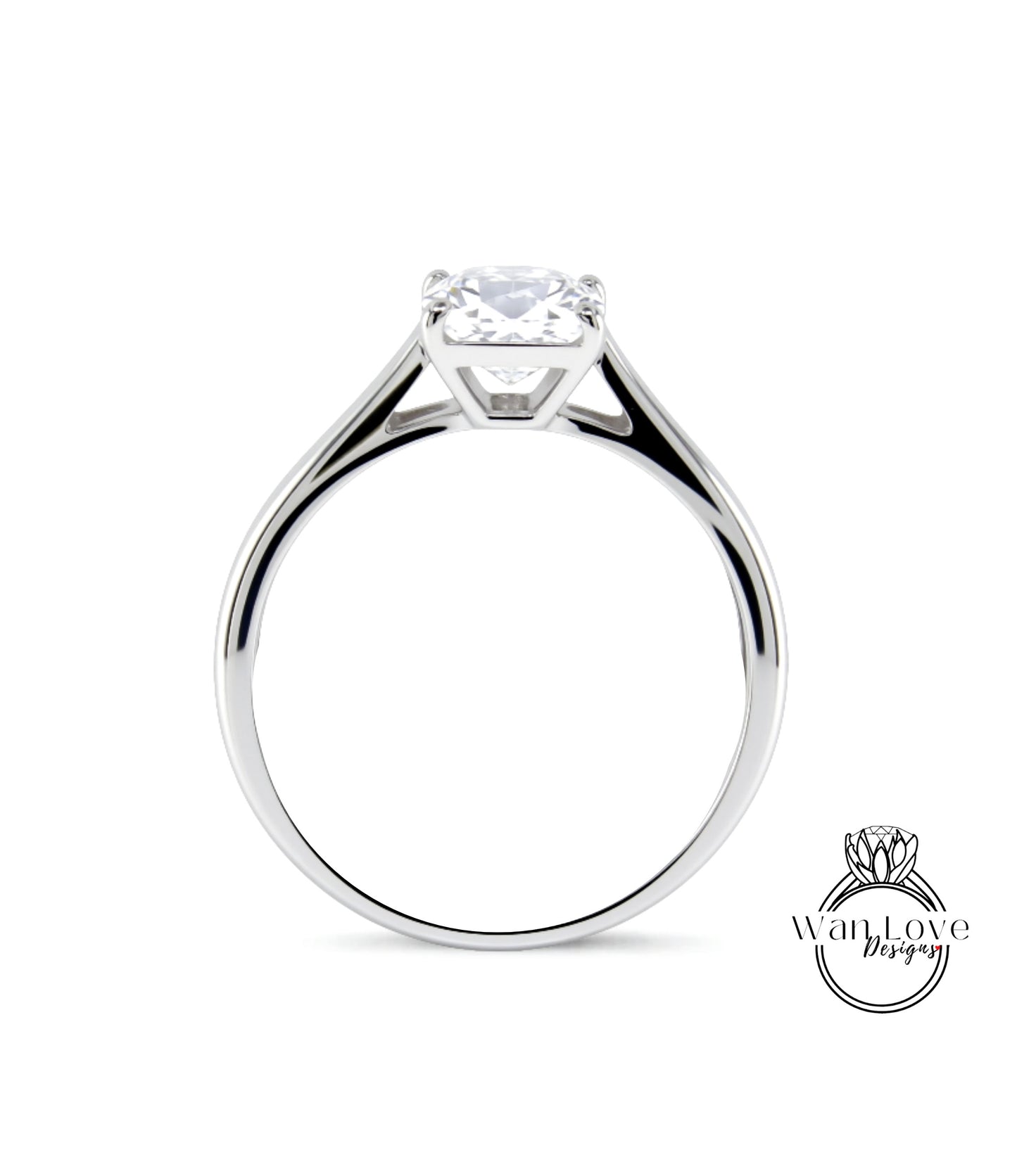 A silver engagement ring with a large diamond set in the center.