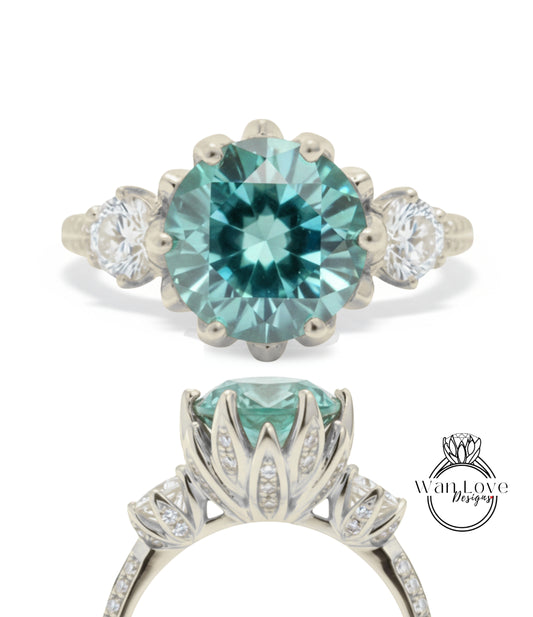 A stunning engagement ring with a large, brilliant blue gemstone set in a silver band, surrounded by smaller diamonds.