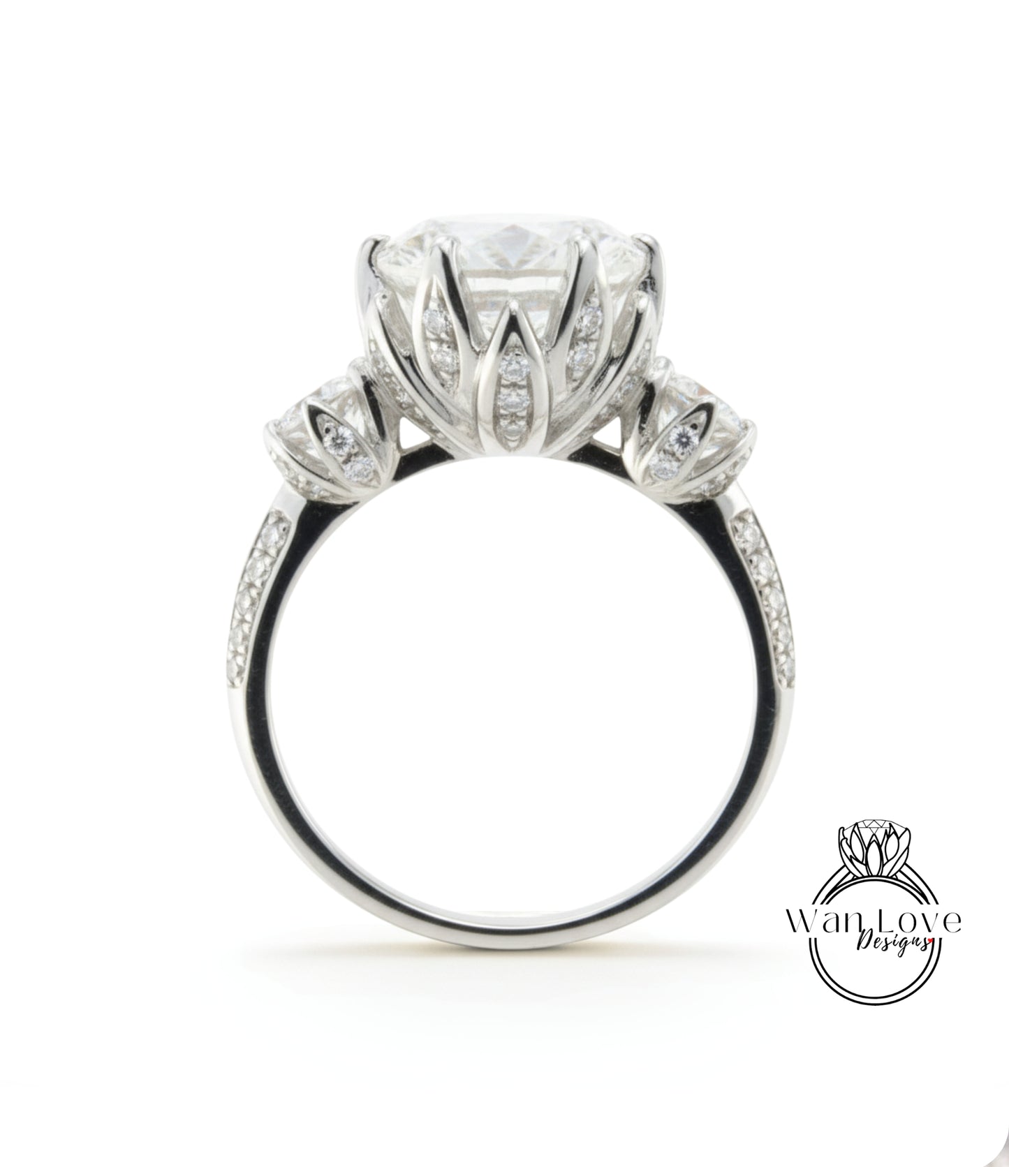 A stunning diamond engagement ring with a large central diamond surrounded by smaller diamonds on the band.